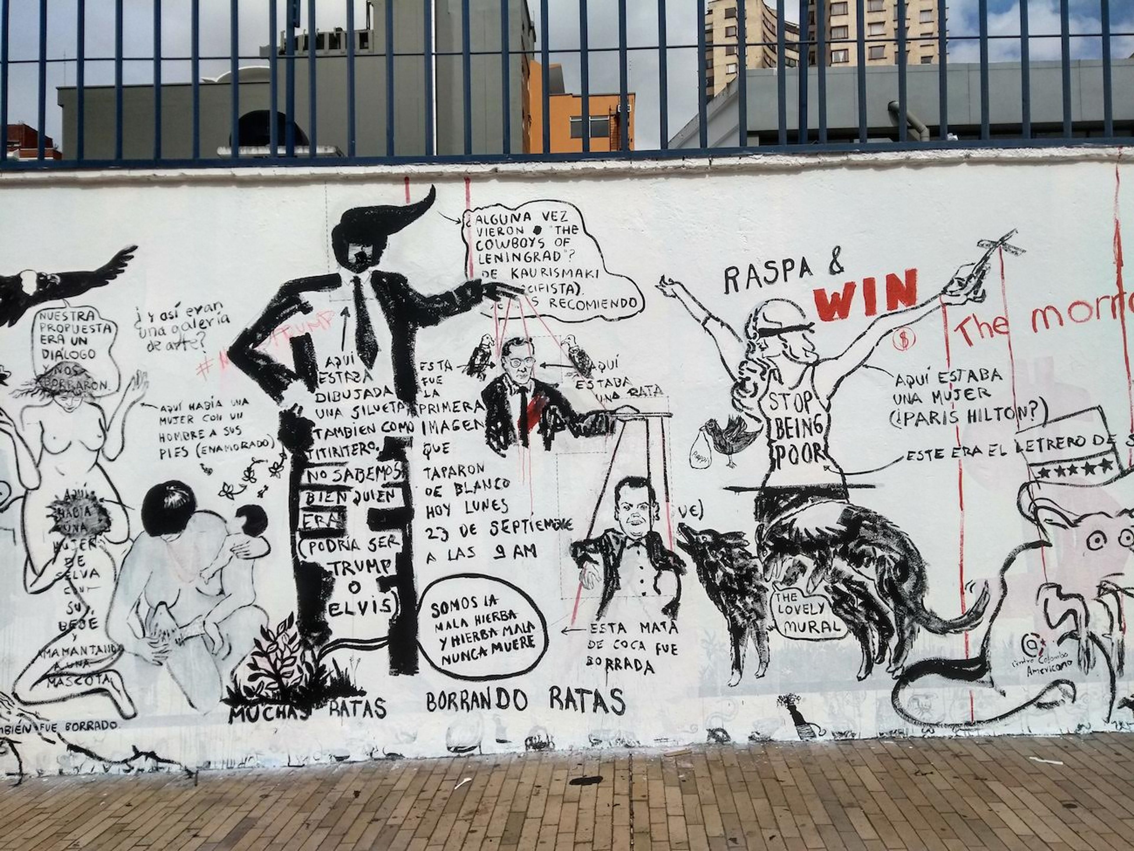 Powerpaola y Lucas Ospina, Mural, Centro Colombo Americano. Arquitecturas Narrativas. The piece was censored and painted white by the institution, and then re-painted by the artists and other people who joined the act against censorship.