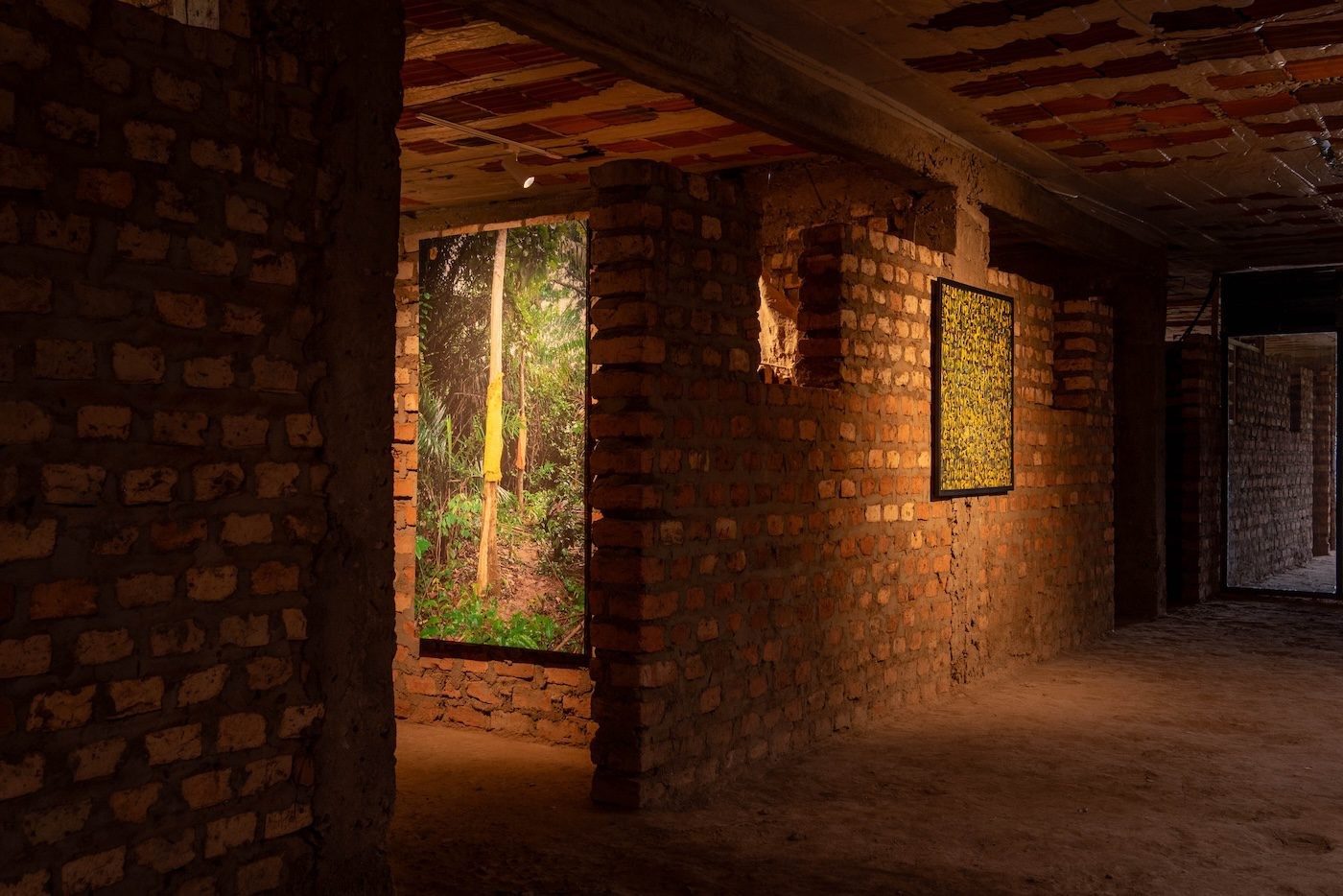 Piloya Irene, Metaphors of Reflection (DAA II, III, IV and GOMSI), 2023, installation comprising photography and Kyenkyen barkcloth, variable dimensions at Silent Invasions: The Art of Material Hacking. Photo: Atiko Anthony