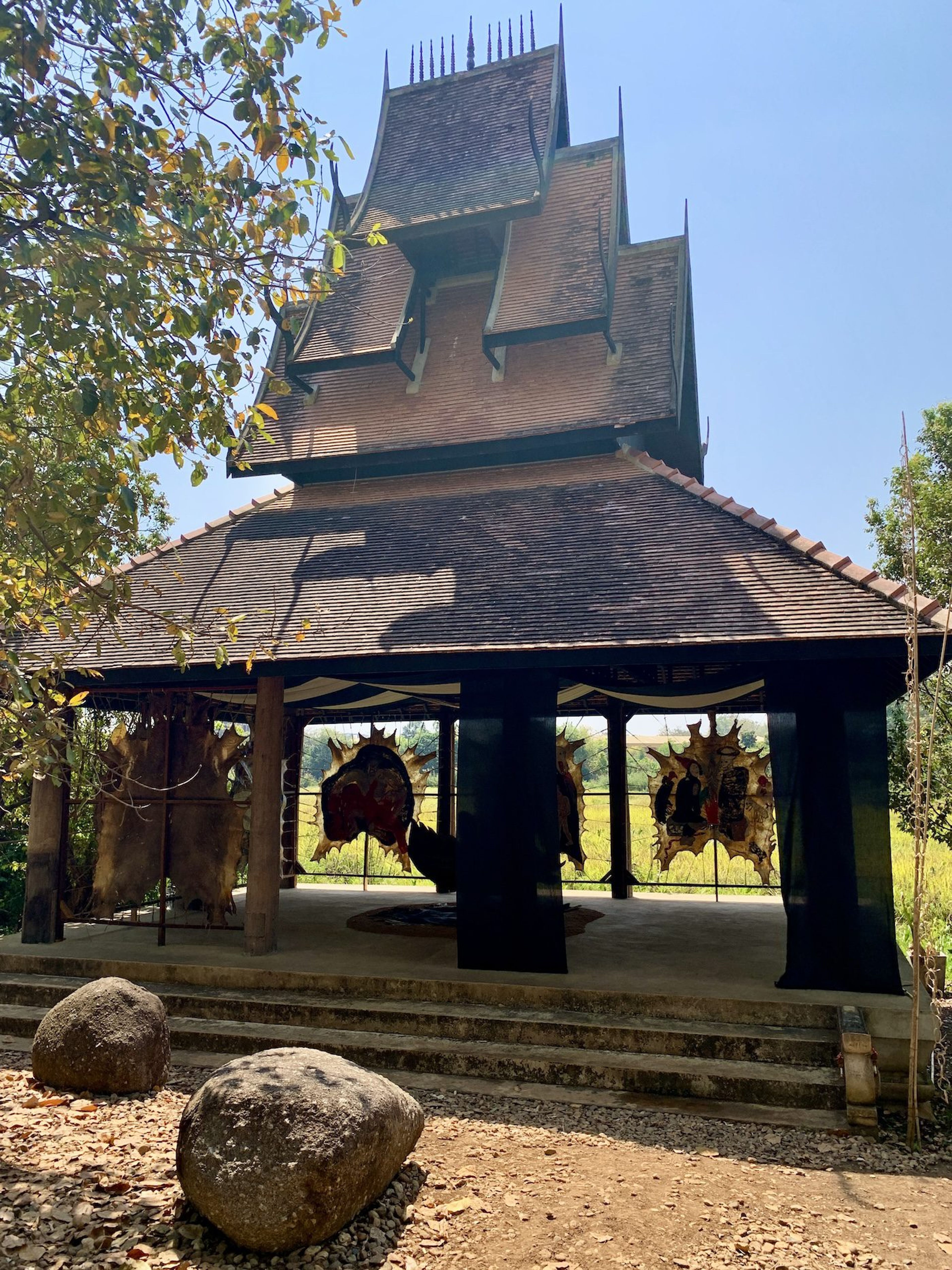 Busui Ajaw, Mor Doom and Ya Be E Long, 2023. This installation is designed to preserve the Akha heritage and traditional wisdom through eight paintings on a vast piece of animal skin. Photo: C&amp;