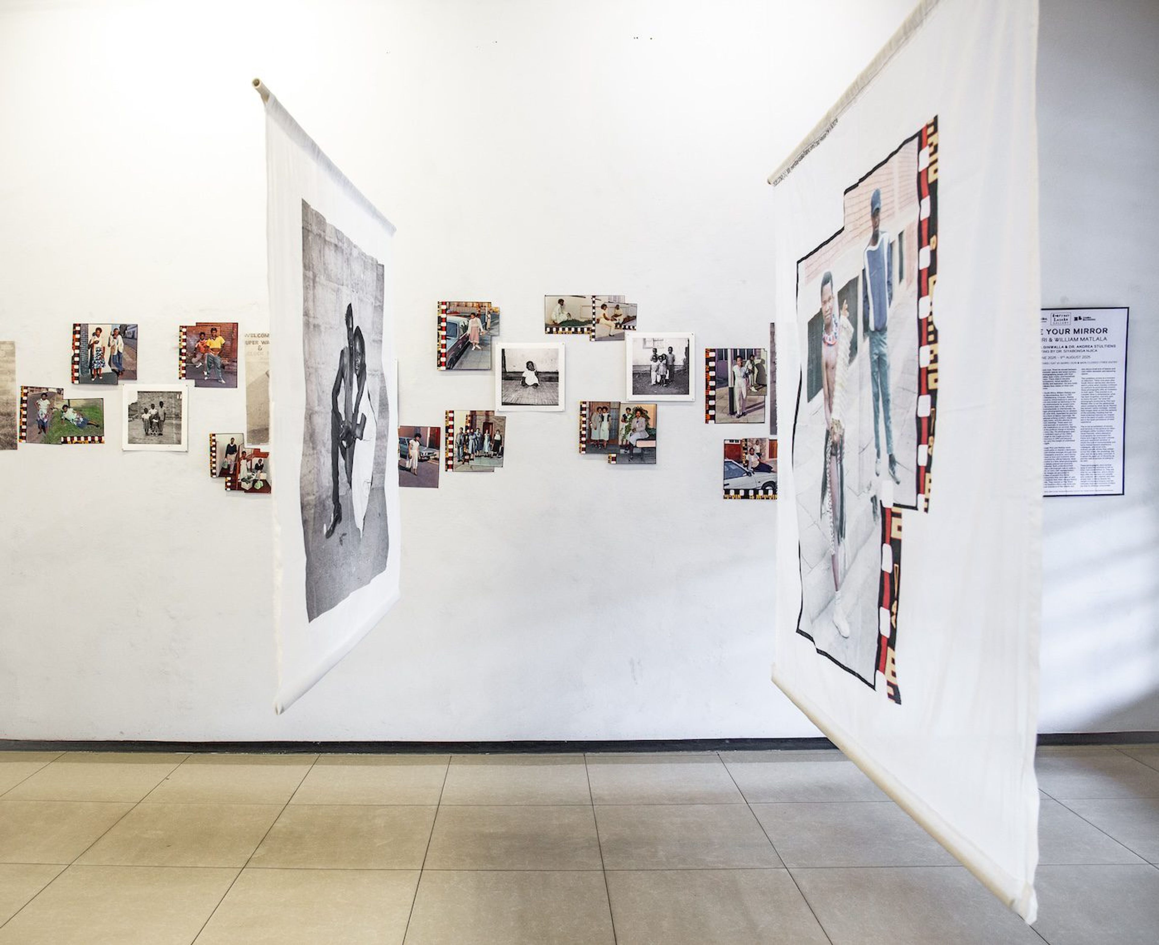 Installation view “I’ll Be Your Mirror”, Artists: Alick Phiri &amp; William Matlala, Everyday Lusaka Gallery, Lusaka 2025. Alick Phiri artworks: Monoprints on Canvas and Monoprints on Paper, Digital Prints on Fabric. William Matlala artworks: Digital prints on paper, Digital Prints on Fabric. Photo Courtesy of Maingaila Muvundika.