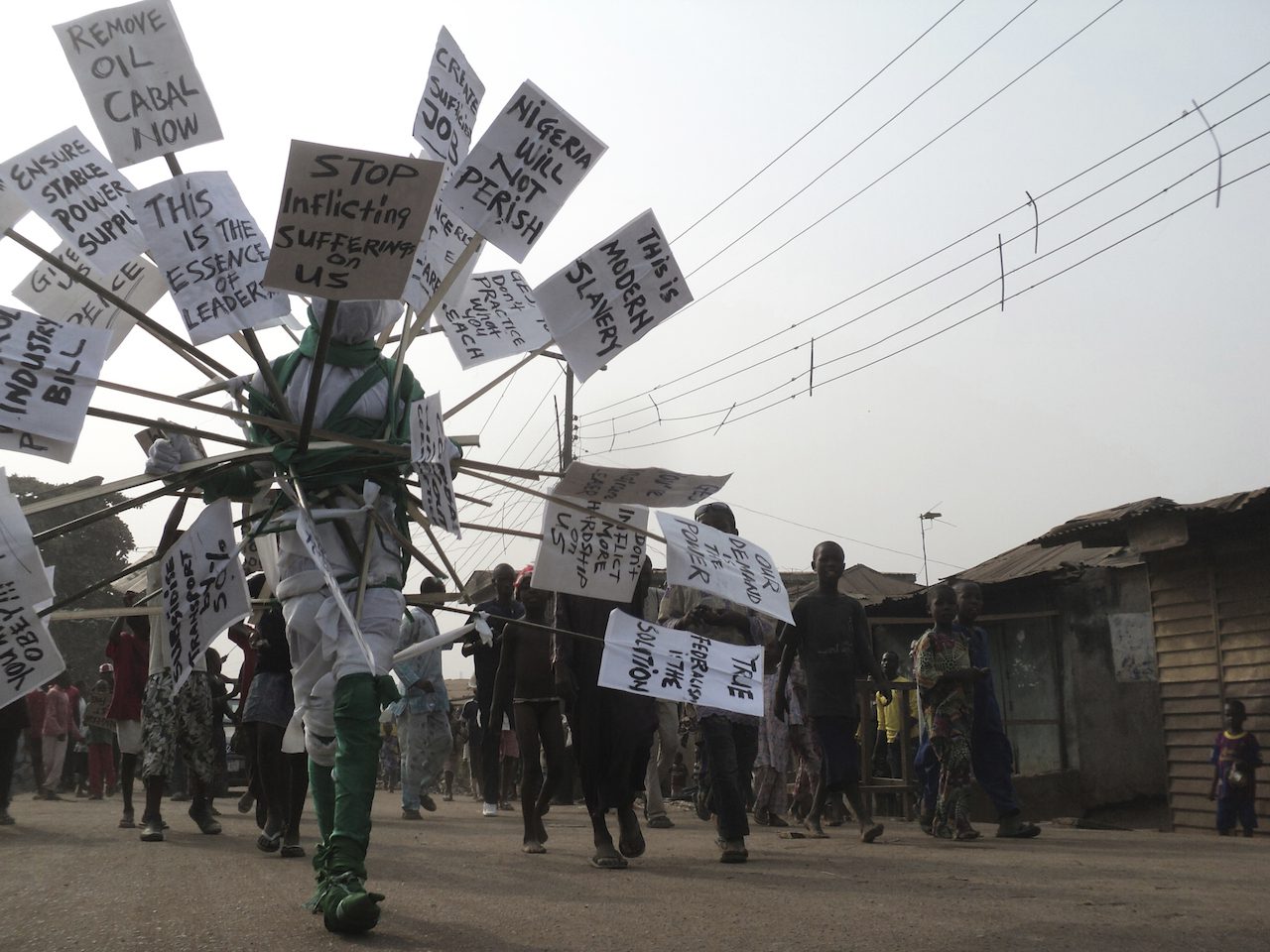 Jelili Atiku (Nigerian, born 1968). Nigerian Fetish (Occupy Nigeria #1), Ejigbo, Lagos, Nigeria, 2012. Performance documentation. © Jelili Atiku. (Photo: Tajudeen Busari)
