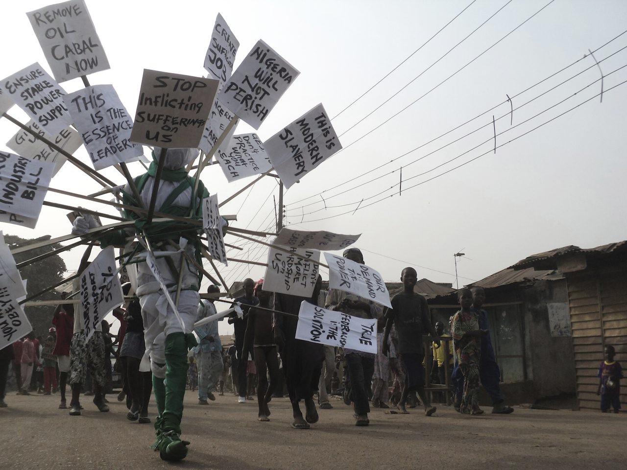 Jelili Atiku (Nigerian, born 1968). Nigerian Fetish (Occupy Nigeria #1), Ejigbo, Lagos, Nigeria, 2012. Performance documentation. © Jelili Atiku. (Photo: Tajudeen Busari)