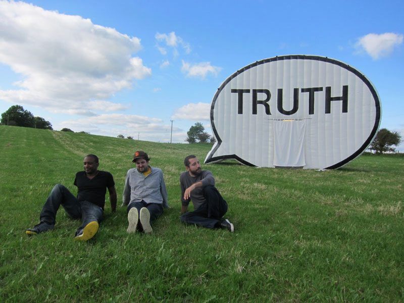IN SEARCH OF THE TRUTH (THE TRUTH BOOTH) BY HANK WILLIS THOMAS AND THE CAUSE COLLECTIVE