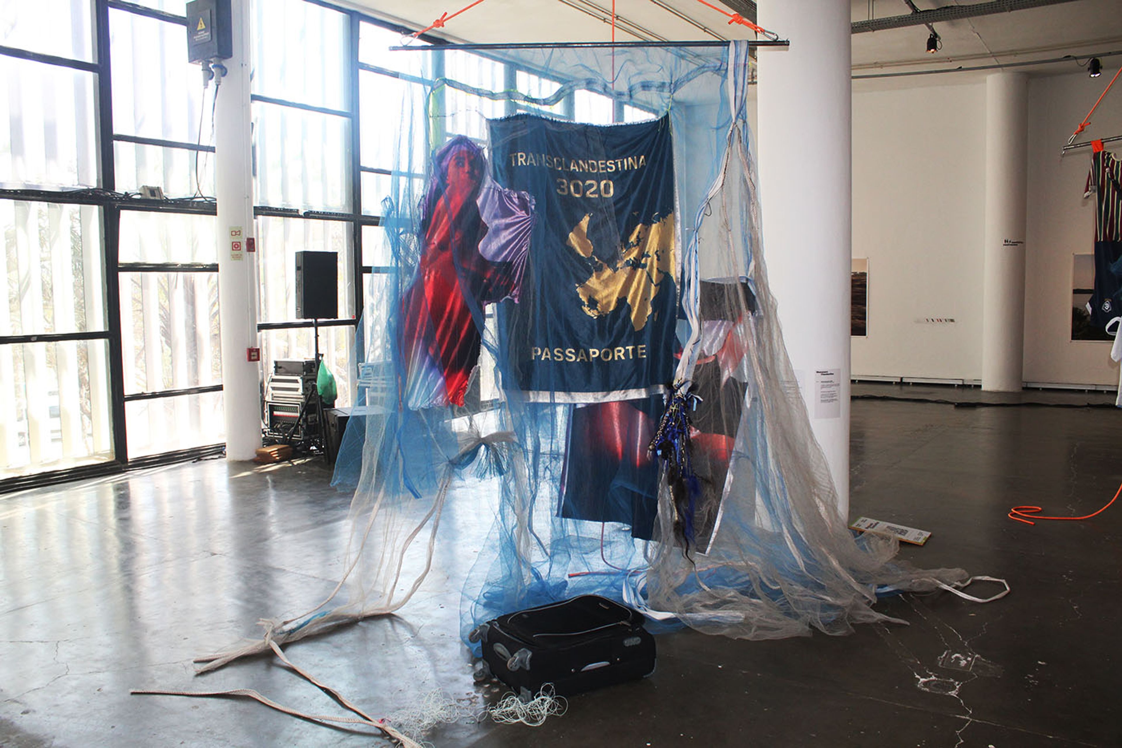 Manauara Clandestina, Transclandestine 3020. Installation composed of textile pieces, photographs, and video 20'. Courtesy: Mitre Galeria. Commissioned by Fundação Bienal de São Paulo for the 36th Bienal. This participation is supported by]: Institut für Auslandsbeziehungen - IFA. Photo: Cristian Baena