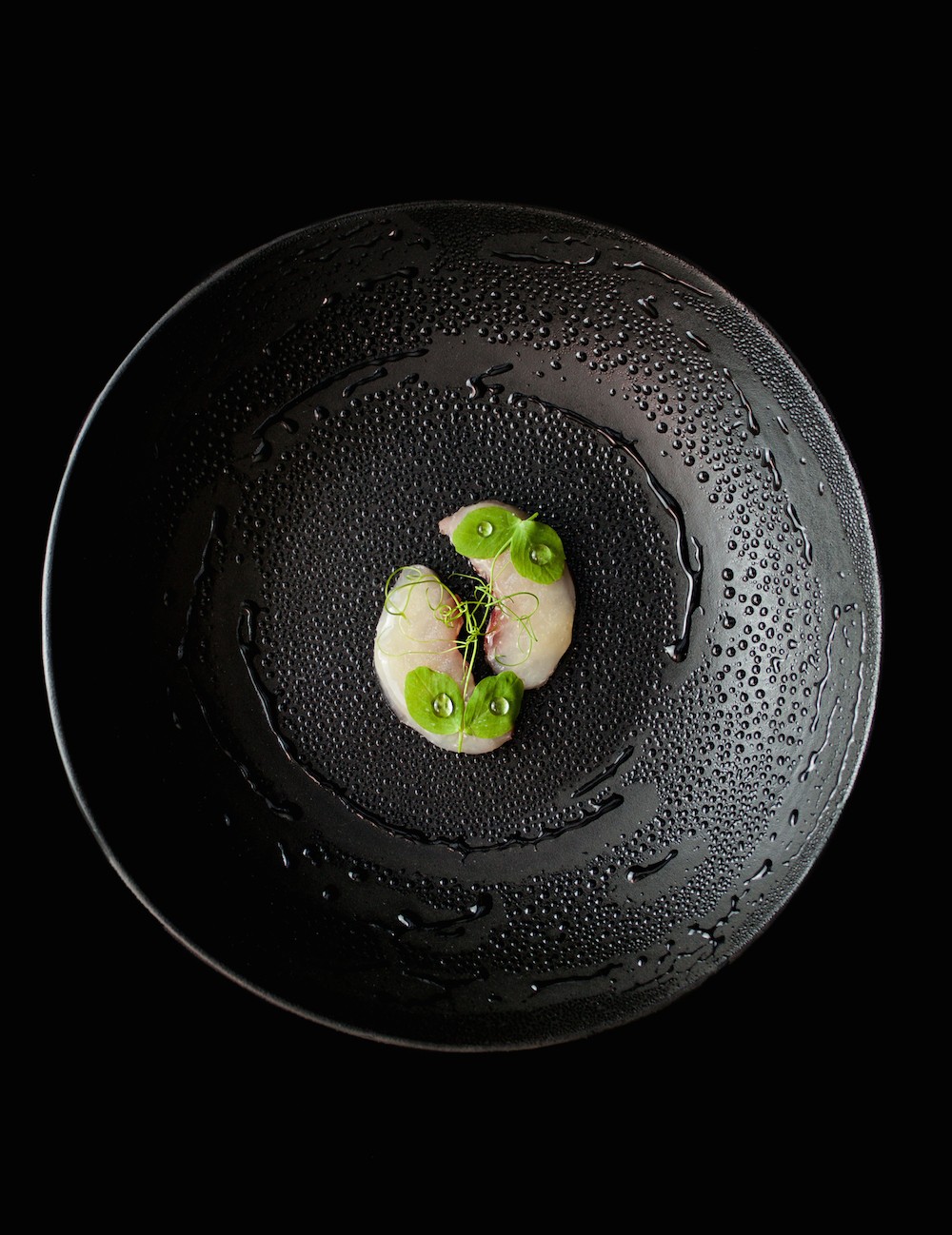 Fish, water quiche, güesgüin, copoazú, pea. Courtesy of Resturante Leo.