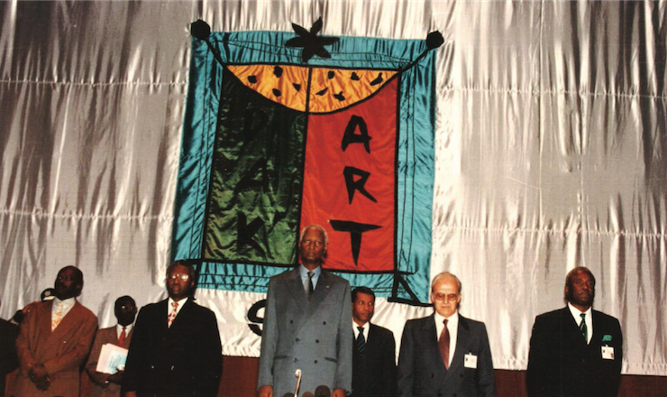 Opening Ceremony of Dak’Art 1996 Daniel Sorano Theatre Dakar 1996 President Abdou Diouf is standing in the middle Courtesy of Dak’Art Biennale Secretariat