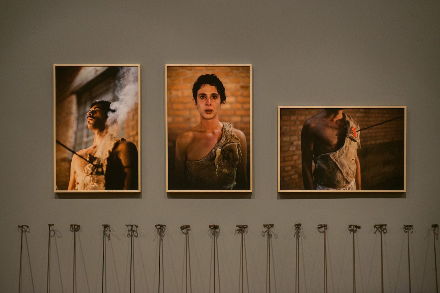 From left to right: Ayrson Heráclito, Bruno Maldegan, “Transmutação da Carne” (Transmutation of the Flesh) Performance, 2015, photograph printed with mineral pigments on Canson Rag Photographique 310 g/m² - by Christian Cravo. Courtesy Simões de Assis, São Paulo, SP and Curitiba, PR. Lívia Piccolo, “Transmutação da Carne” (Transmutation of the Flesh) Performance, 2015, photograph printed with mineral pigments on Canson Rag Photographique 310 g/m² - by Christian Cravo. Courtesy Simões de Assis, São Paulo, SP and Curitiba, PR. Branding iron, "Transmutação da carne" Transmutation of the Flesh) Performance, 2015, photograph printed with mineral pigments on Canson Rag Photographique 310 g/m² by Christian Cravo. Courtesy Simões de Assis, São Paulo, SP and Curitiba, PR. Photo: Levi Fanan/Pinacoteca de São Paulo