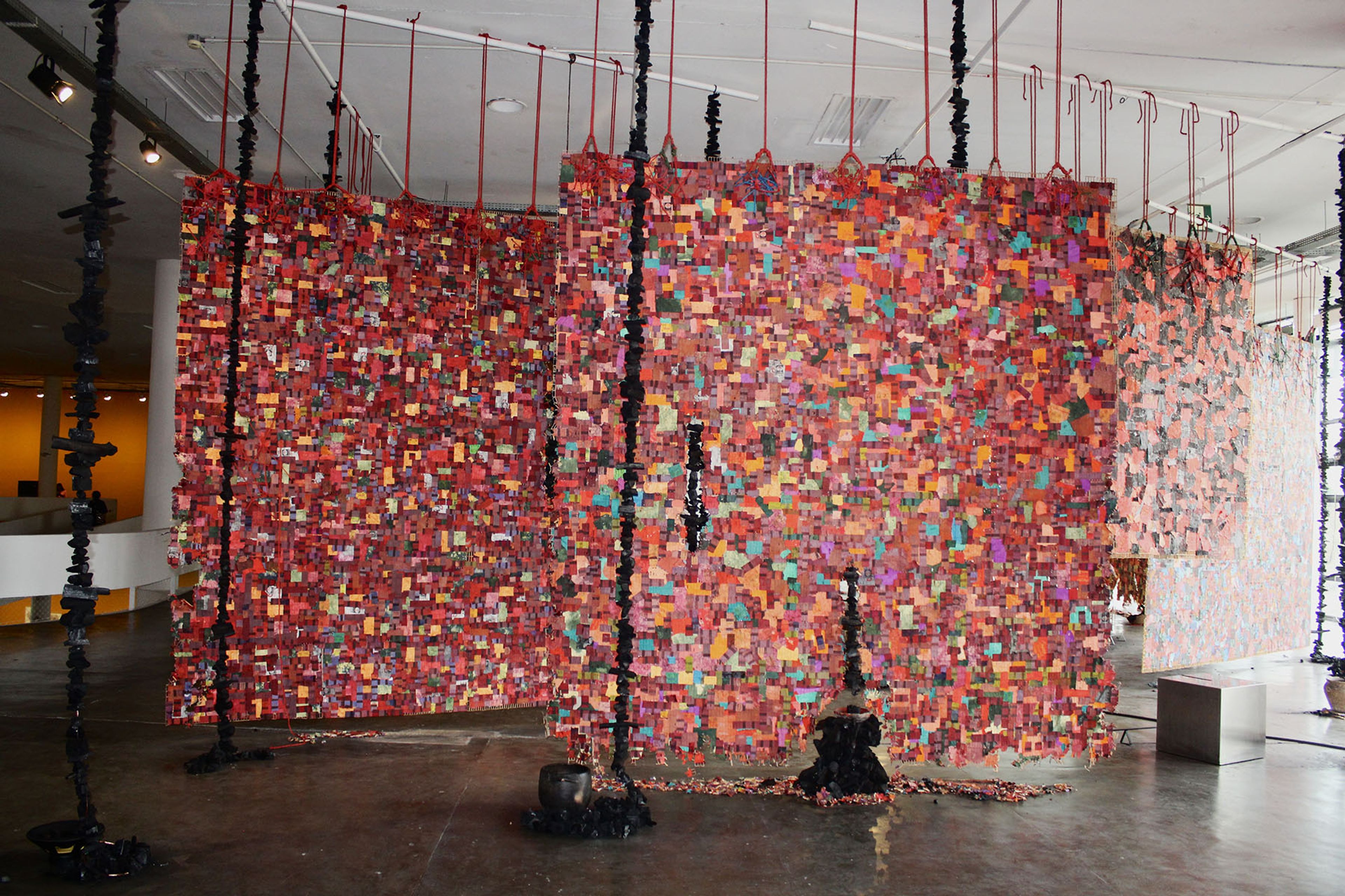 Antonio Társis, catastrophe orchestra #1 (Act 1), 2024-2025. Balsa wood, matchboxes, matchsticks, paper, pigments, water, braided nylon cords, sisal ropes, charcoal, debris, metal, wood, leather, drums, automation mechanism with motor, clay pots, copper wires, audio cables, and speakers. Courtesy: Fortes D’Aloia &amp; Gabriel and Carlos/Ishikawa. Commissioned by Fundação Bienal de São Paulo for the 36th Bienal. Photo: Cristian Baena
