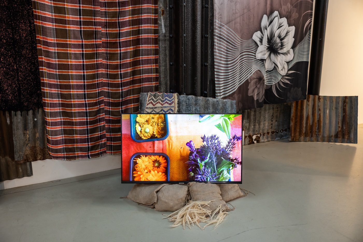 Installation view of Sibaaq (2024) by Kinsi Abdulleh from the exhibition The Anarchist Citizenship – People Made of Stories (2024) at Framer Framed, Amsterdam. Photo: Maarten Nauw. Courtesy of Framer Framed.