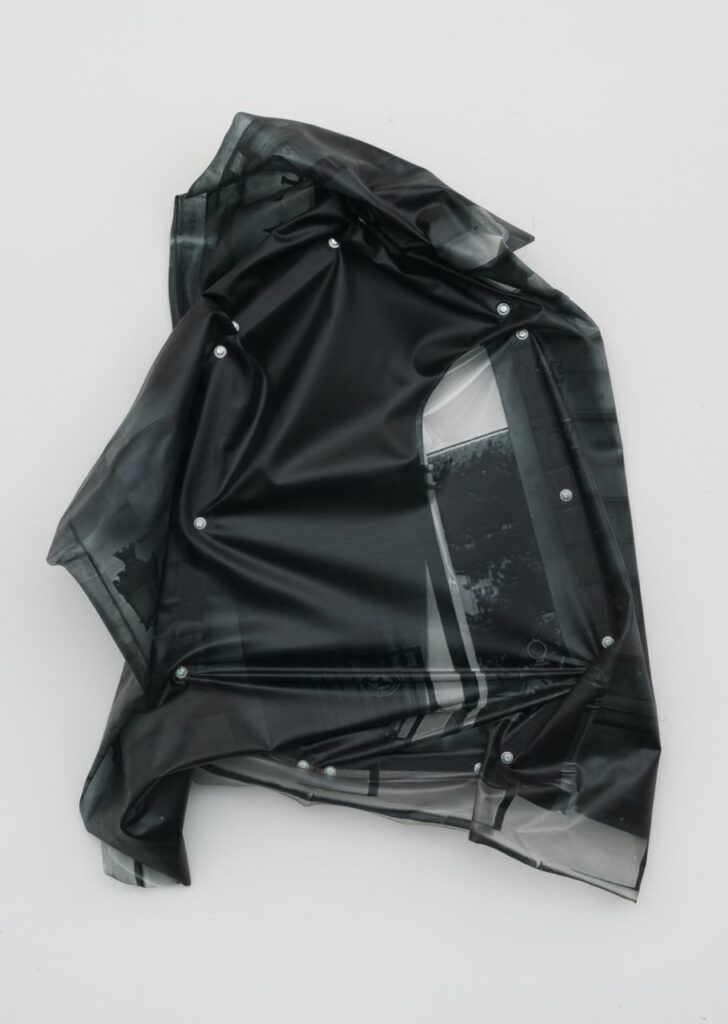 Neil Beloufa Spaceship Door, 2012 Four colour double printed vinyl stretched on steel with bolts Photo courtesy of the Danjuma Collection