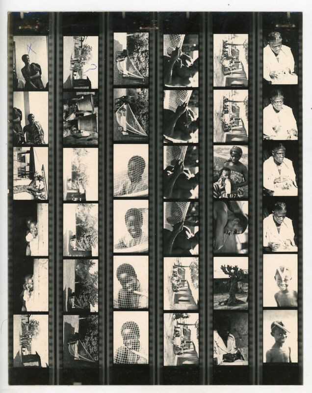 Black and white contact sheet with 35 frames depicting people, some through or holding nets, and various other scenes.