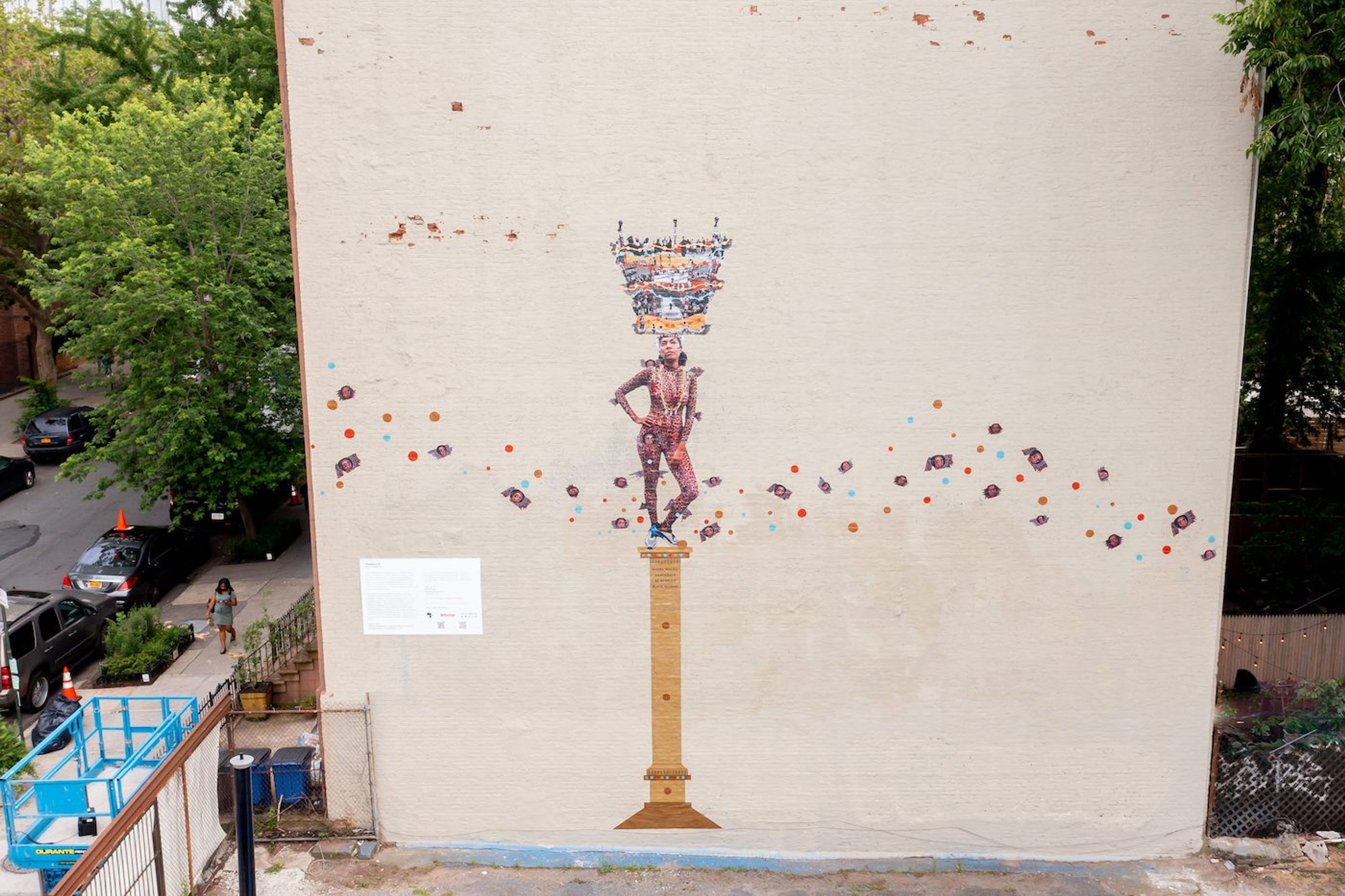Helina Metaferia’s mural featuring Brown crowned with civil rights imagery. It is part of Not a Monolith, an arts initiative that installed works from emerging Black artists across New York City. Courtesy of the artist