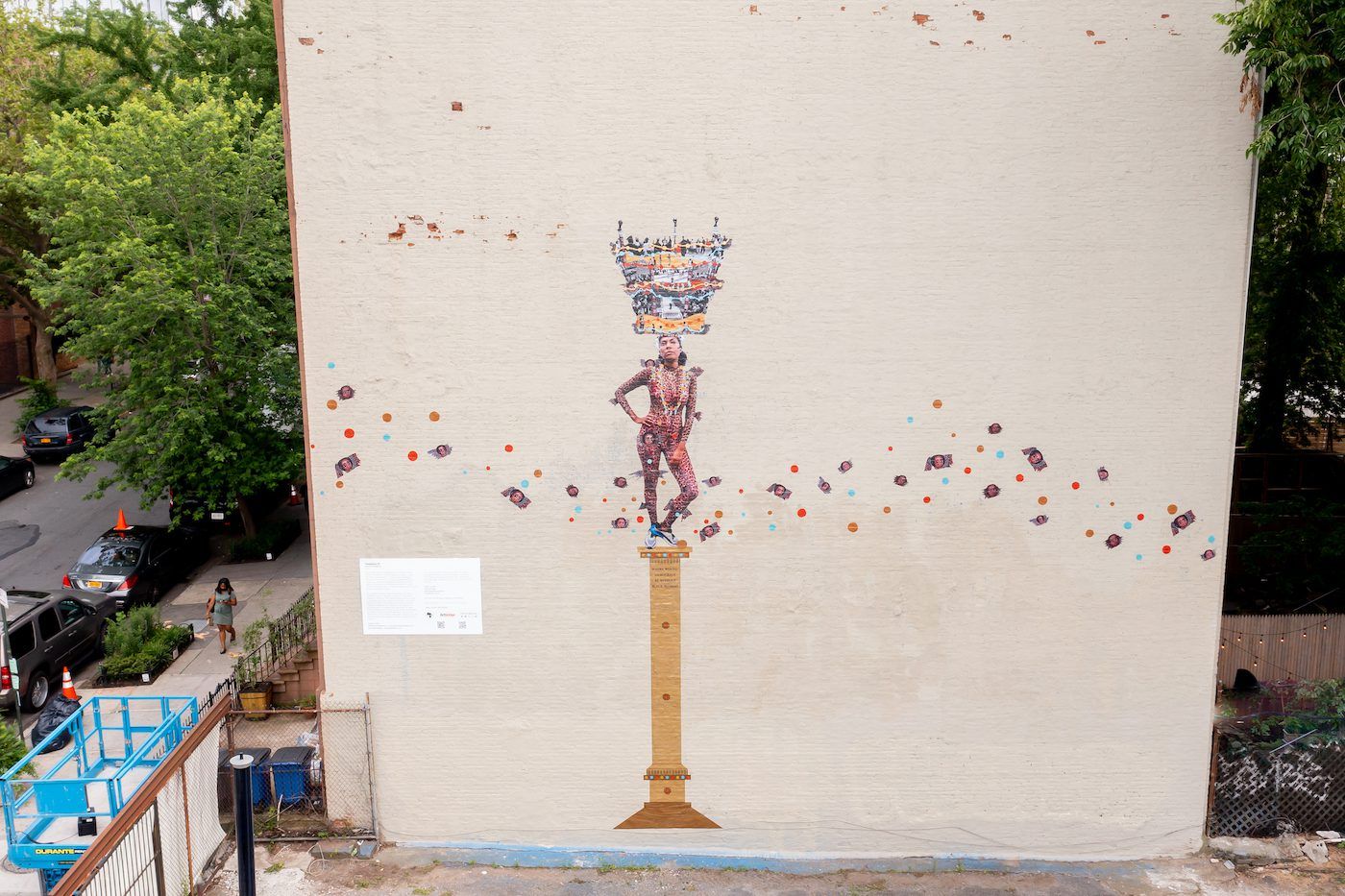 Helina Metaferia’s mural featuring Brown crowned with civil rights imagery. It is part of Not a Monolith, an arts initiative that installed works from emerging Black artists across New York City. Courtesy of the artist