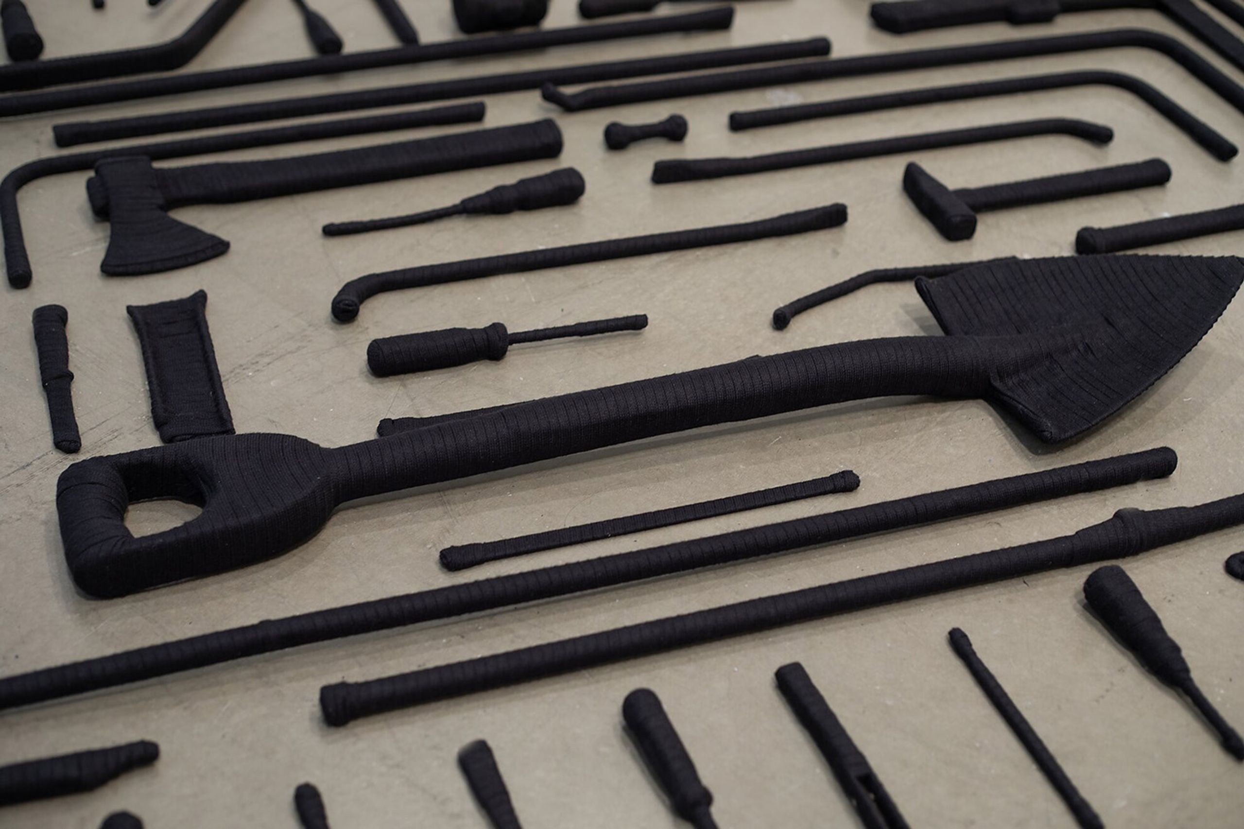 Detailed view: Cinthia Marcelle, em-entre-para-perante #2, 2015/2023, Acrylic on fabric, shoelaces on hardware, variable dimensions. Photo: Hans Schrîder