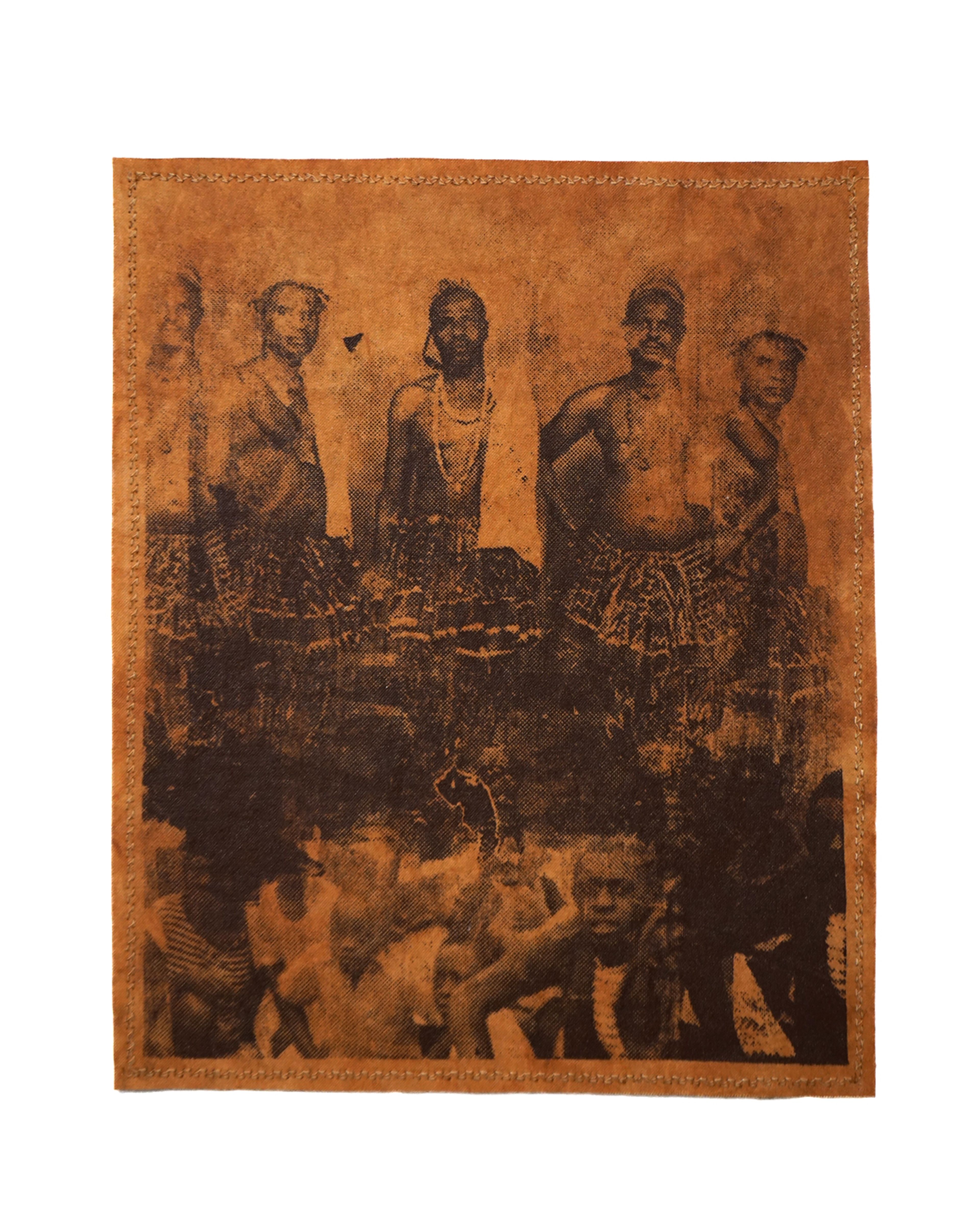 Sepia-toned image on rectangular leather with a stitched border, depicting five standing men in patterned skirts over a darker, indistinct crowd.