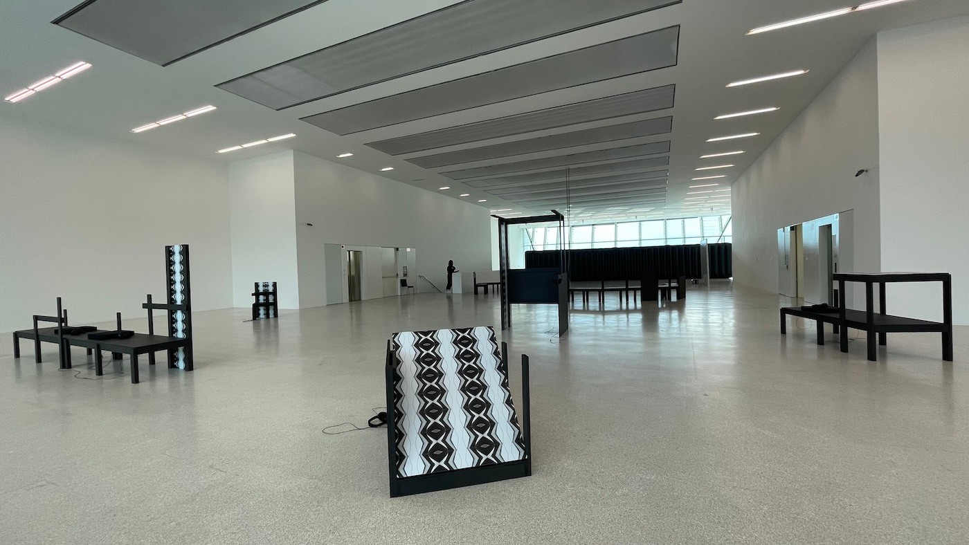 Museion, Techno, 2021. Exhibition View. (In the front: Emeka Ogboh, Beyond the Yellow Haze, 2021). Photo: Jamila Moroder