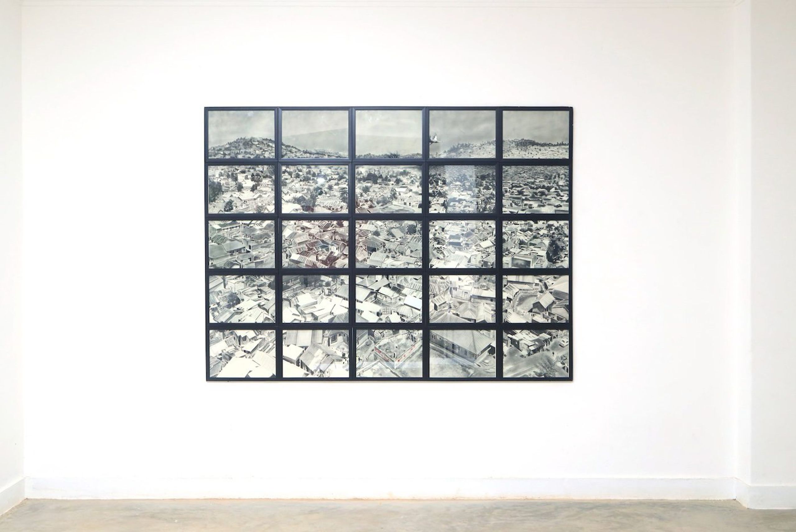 Trevor Aloka, Surveillances, 2023, Charcoal on paper, group of 25, overall dimension 160 x 215 cm at Silent Invasions: The Art of Material Hacking. Photo: Wasswa James