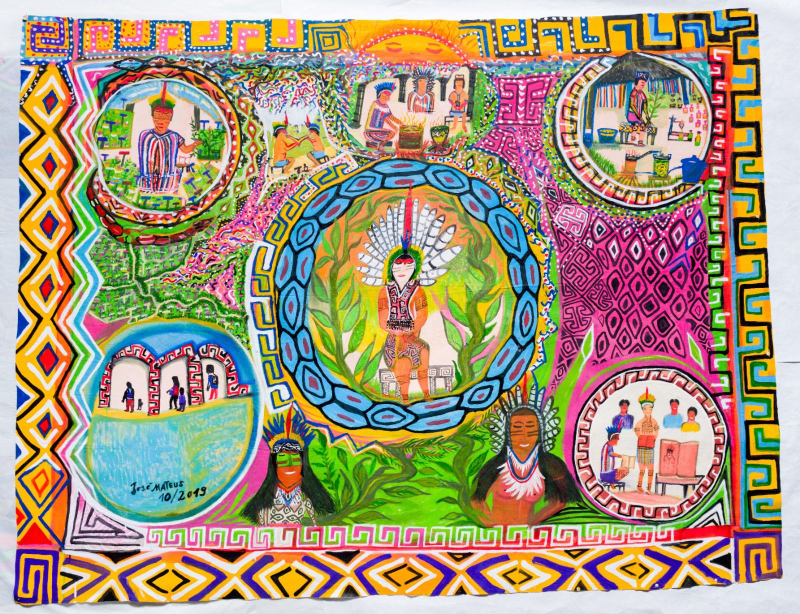 A vibrant, detailed folk art painting depicting indigenous life with a central figure in a feather headdress, surrounded by scenes of daily activities and colorful geometric patterns.