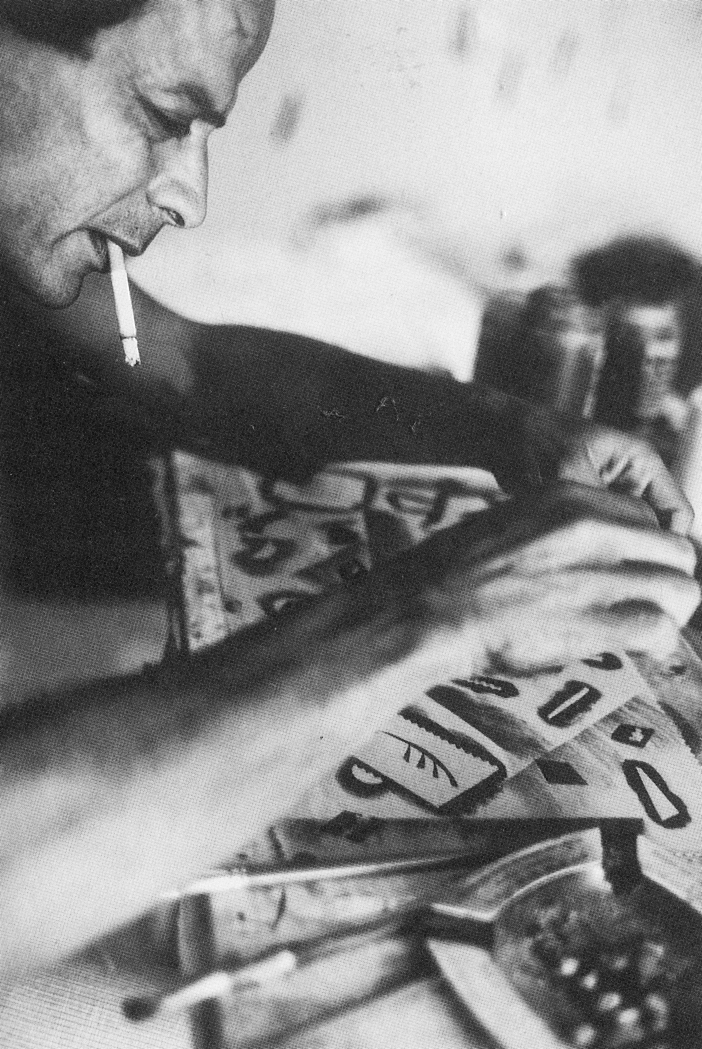 Hamid Zénati’s paintings on textiles are created by decorative shapes, patterns and colours applied by the artist himself using stencils he created from paper, plastic foil and tape.
The artist working with stencils, Algiers, 1986
Photo: Halim Zénati.