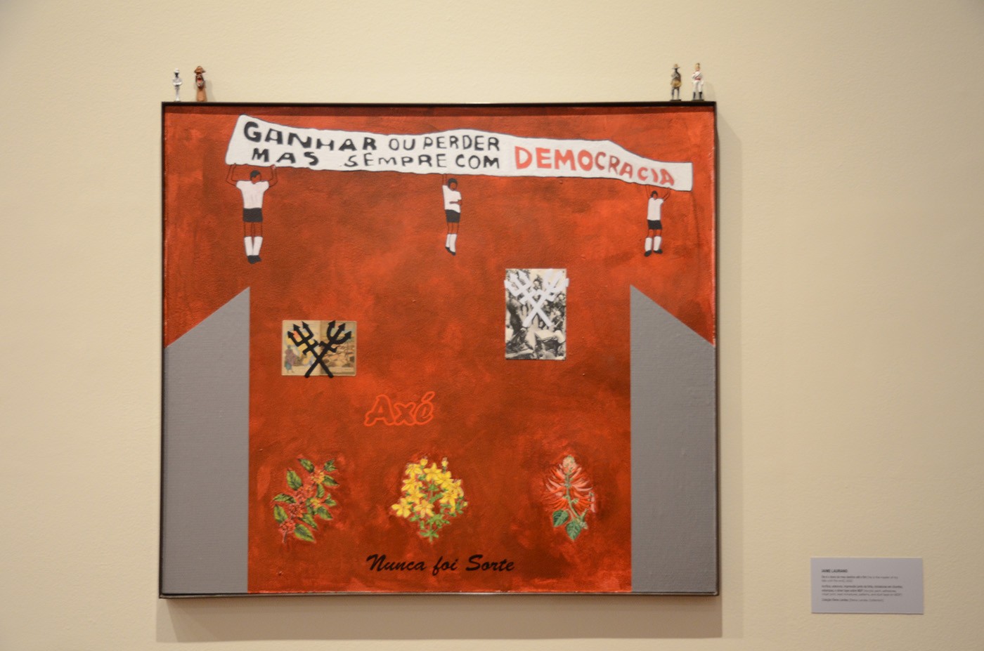 Jaime Lauriano, Ele é o dono do meu destino até o fim, (“He is the master of my destiny until the end”, 2022), acrylic, stickers, inkjet print, lead miniatures, prints and silver ribbon. Photo: Filipe Berndt