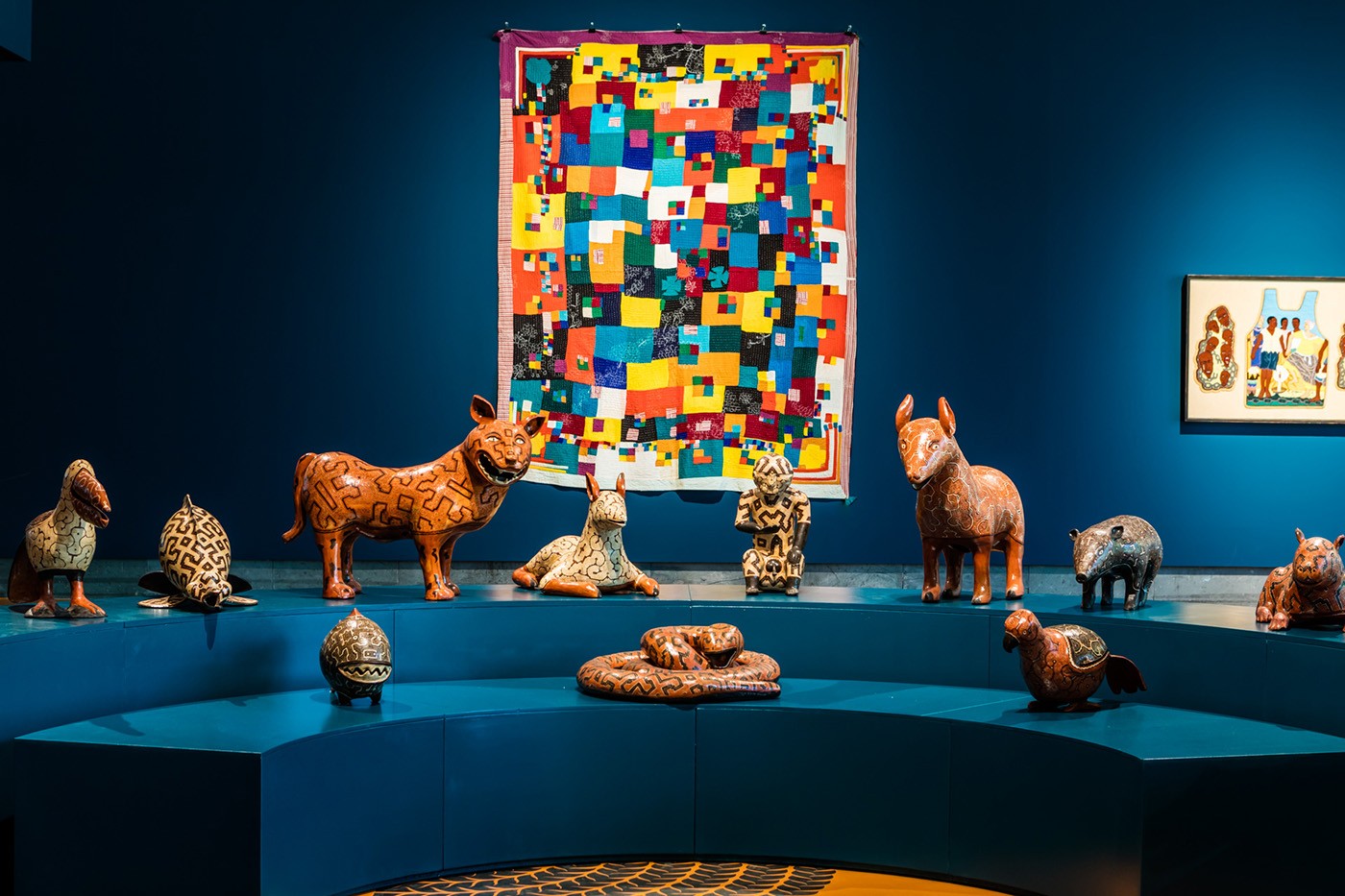 Celia Vasquez Yui with Diana Ruiz Vasquez, The Council of the Mother Spirits of the Animals (2020/23), courtesy of the artists and Shipibo Conibo Center, NY; Bastin Santan Diggekar, Untitled (2023), courtesy of the artist. Installation view of O Quilombismo: Of Resisting and Insisting. Of Flight as Fight. Of Other Democratic Egalitarian Political Philosophies, Haus der Kulturen der Welt (HKW), 2023. Photo: Laura Fiorio/HKW