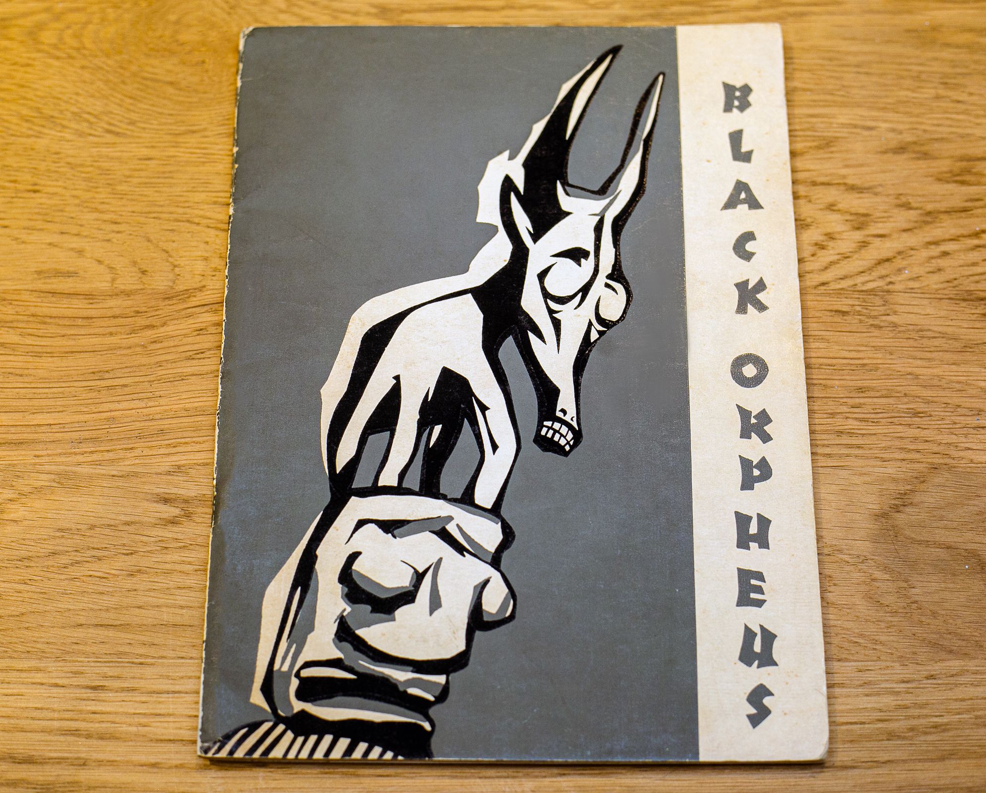 Cover of "BLACK ORPHEUS" magazine with a stylized black, white, and gray illustration of a hand and a horned, skeletal creature's head.