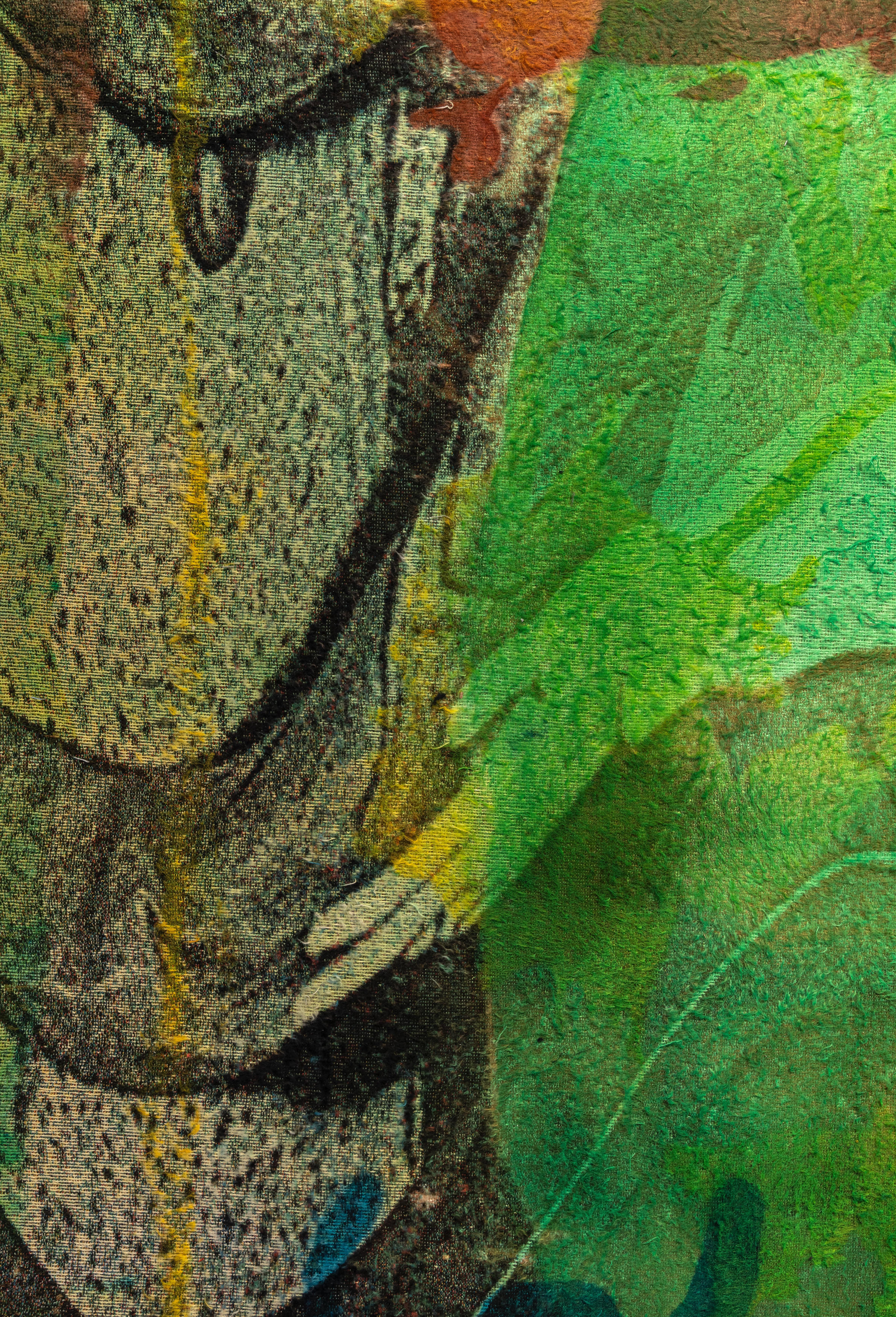 Abstract close-up of textured artwork with green, gray, and yellow paint.