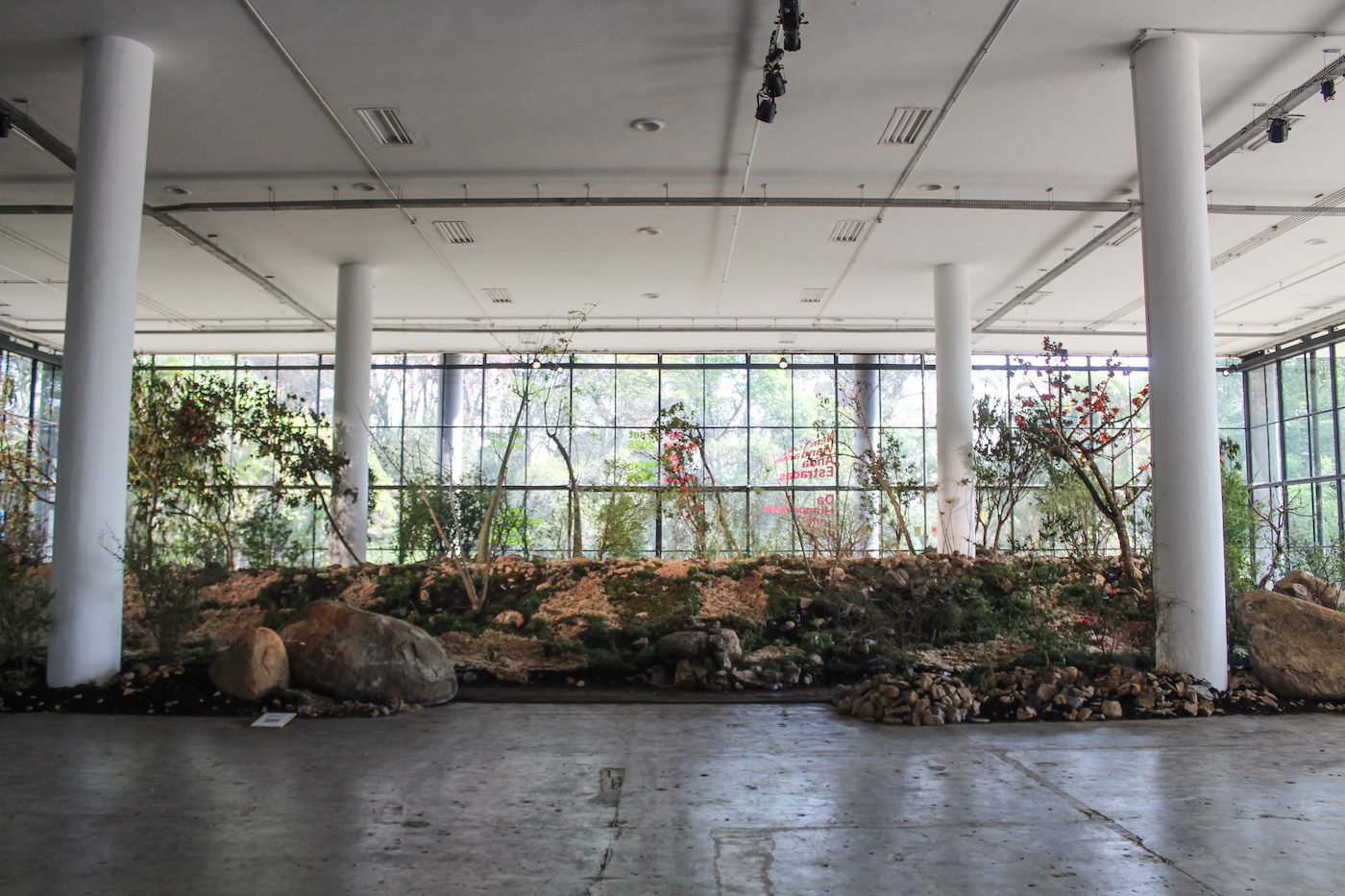 Work by Precious Okoyomon. Installation view at Ciccillo Matarazzo Pavilion, Fundação Bienal de São Paulo . Images by Cristian Baena / Contemporary And (C&amp;).
