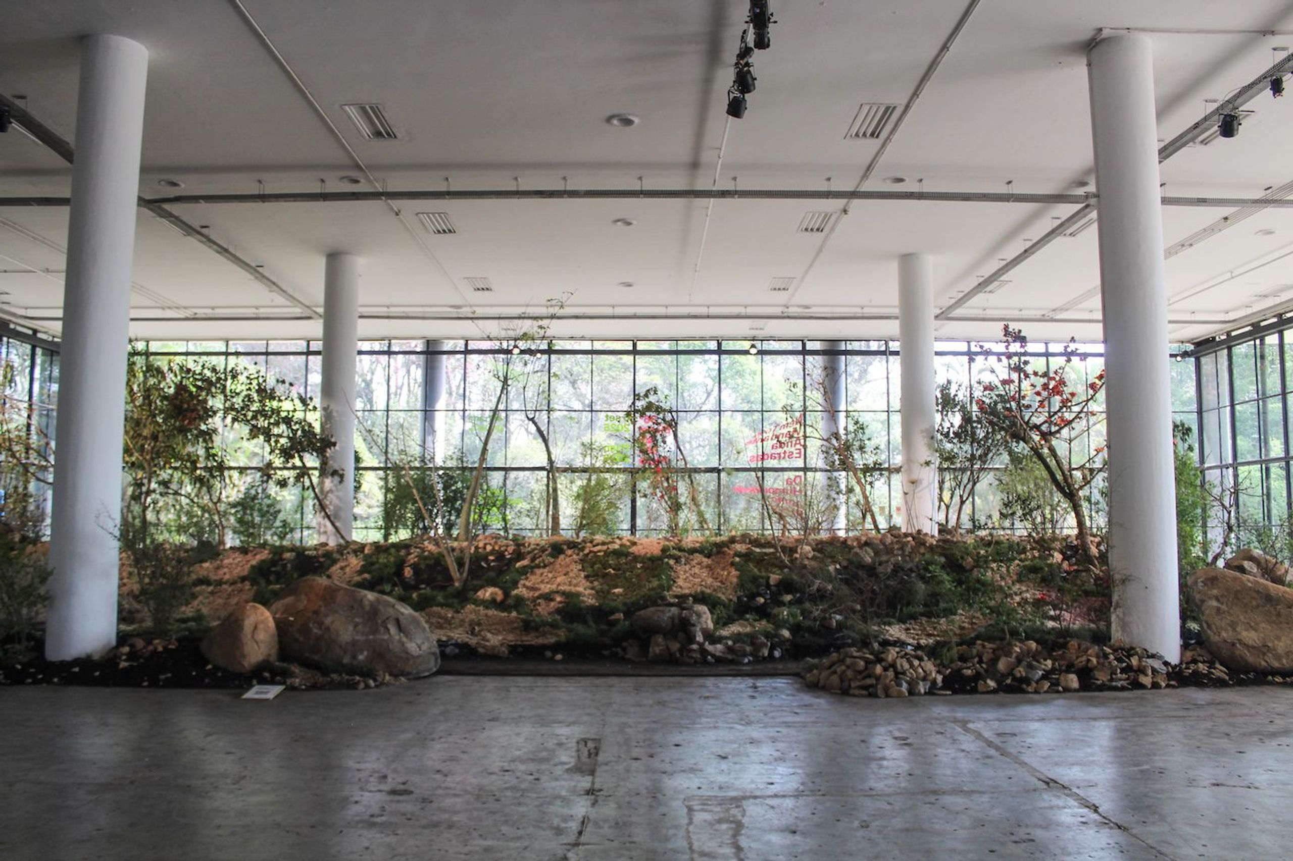 Work by Precious Okoyomon. Installation view at Ciccillo Matarazzo Pavilion, Fundação Bienal de São Paulo . Images by Cristian Baena / Contemporary And (C&).