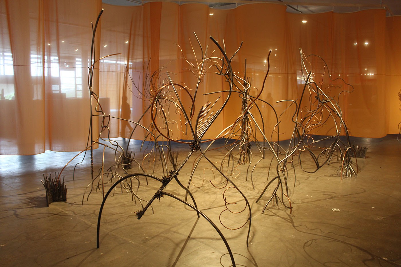Rebeca Carapia, How to Create Aerial Roots, steel, carbon, and copper. Courtesy Almeida & Dale. Commissioned by Fundação Bienal de São Paulo for the 36th Bienal. Photo: Cristian Baena