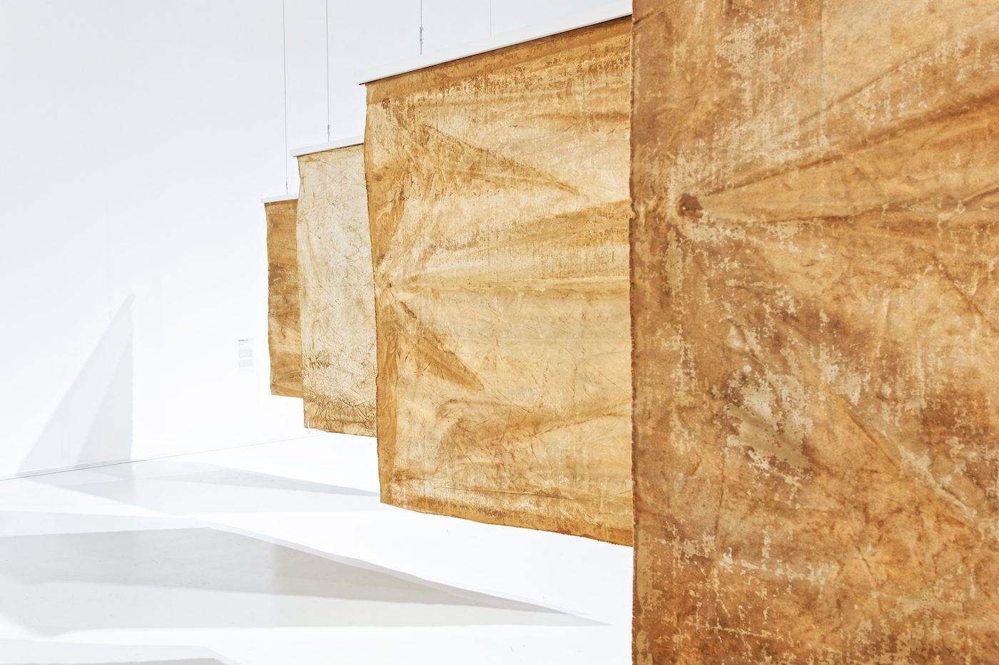 Moshekwa Langa, Drag paintings, 2016, clay on canvas. Courtesy of the artist and Stevenson Gallery, Cape Town, South Africa. View of the exhibition Globalisto. A Philosophy in Flux at the Musée d’art moderne et contemporain de Saint-Étienne Métropole, from June 25th to October 16th, 2022. Crédit photo : C. Cauvet / MAMC+