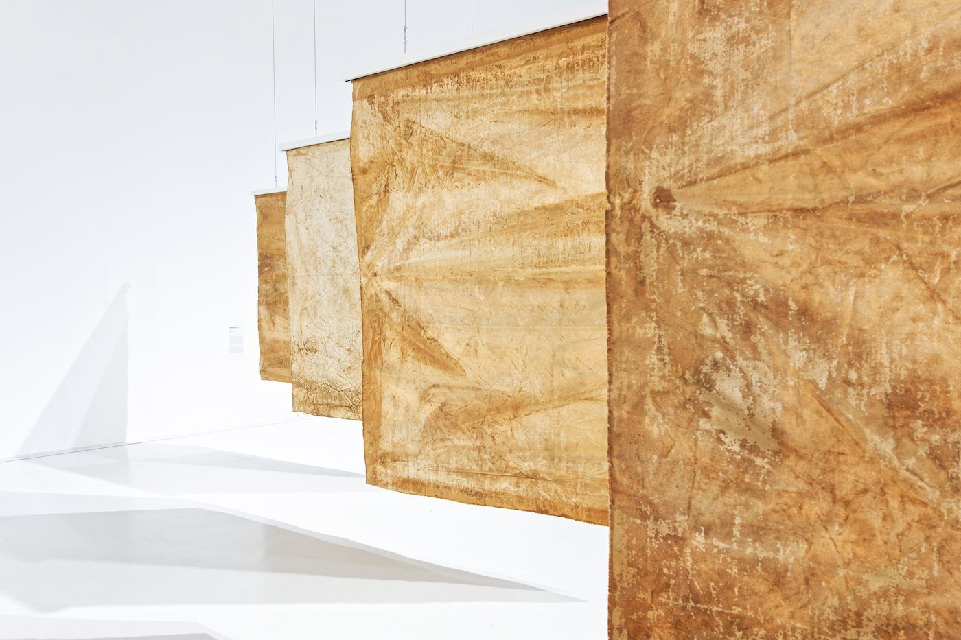 Moshekwa Langa, Drag paintings, 2016, clay on canvas. Courtesy of the artist and Stevenson Gallery, Cape Town, South Africa. View of the exhibition Globalisto. A Philosophy in Flux at the Musée d’art moderne et contemporain de Saint-Étienne Métropole, from June 25th to October 16th, 2022. Crédit photo : C. Cauvet / MAMC+