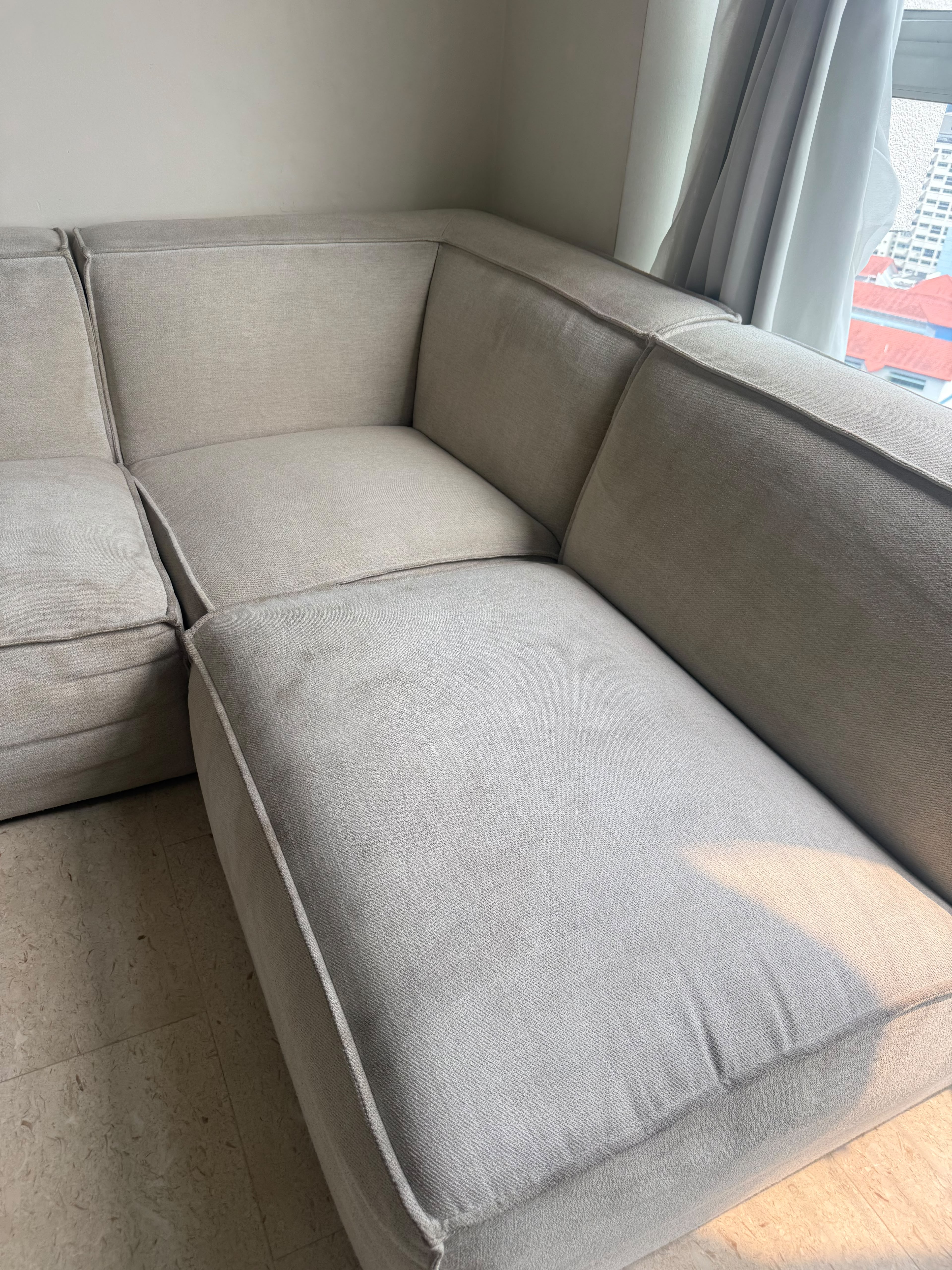 L-shaped sofa before service