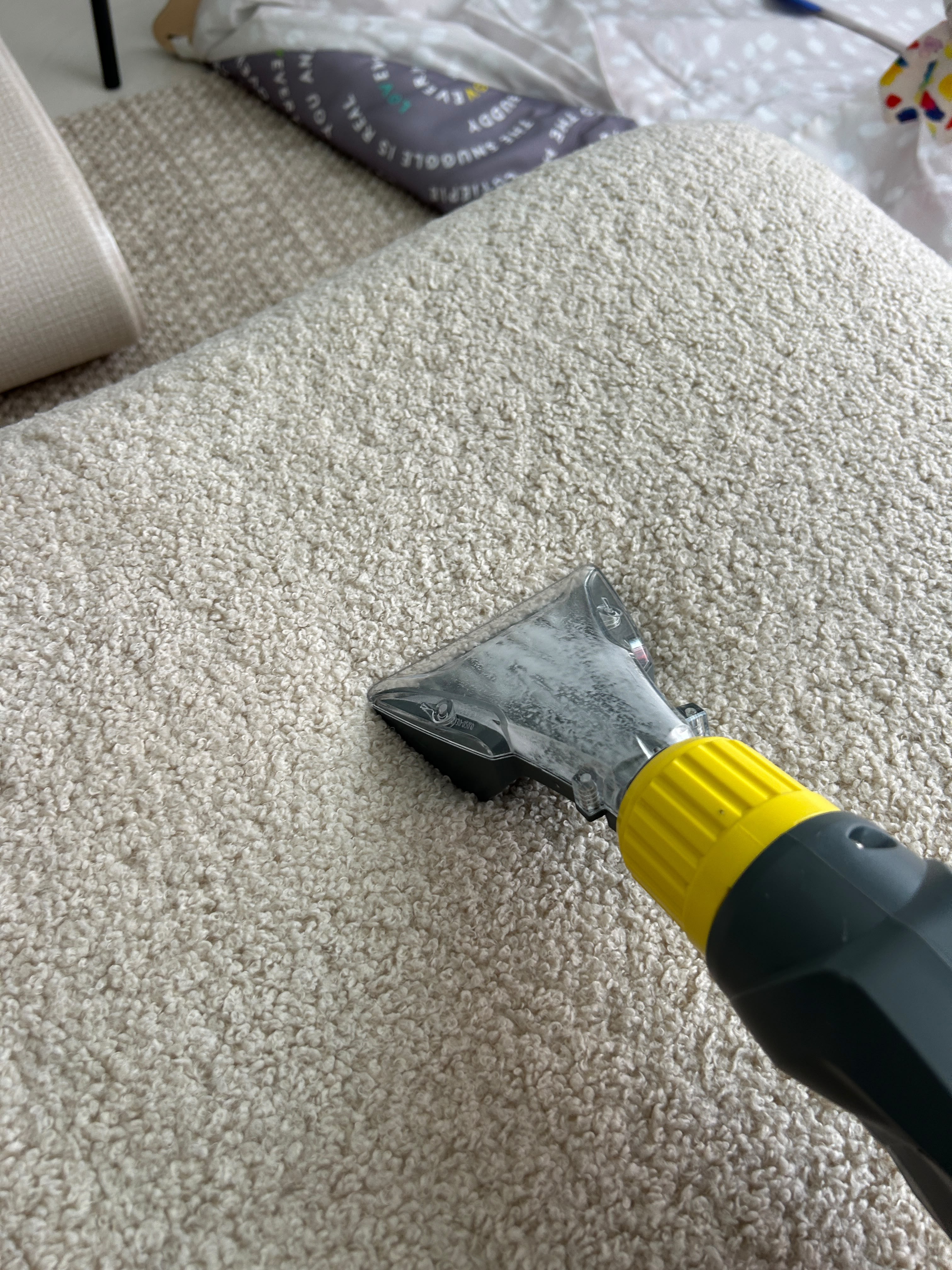 sofa being cleaned