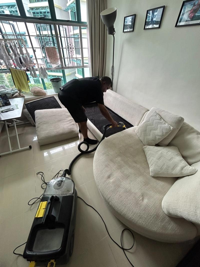 L-shaped sofa being cleaned