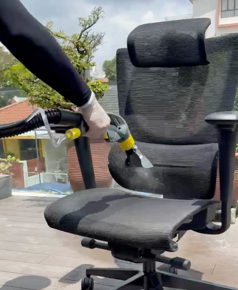 spraying down the ergotune chair