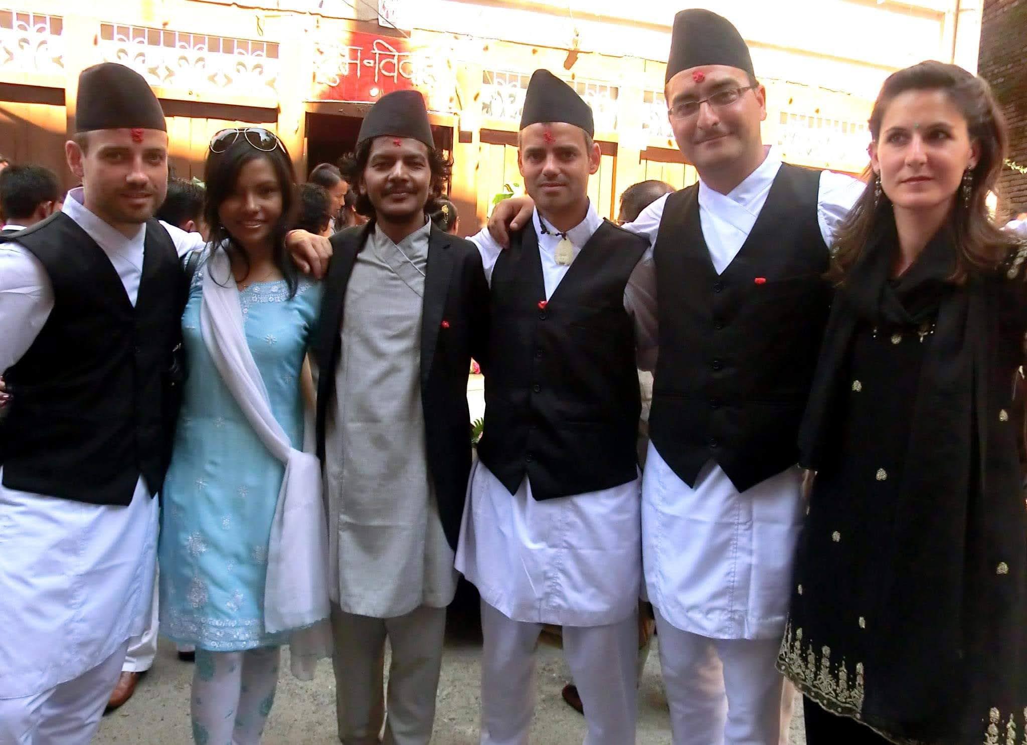 Saroj Khadgi with friends in traditional dress at a celebration