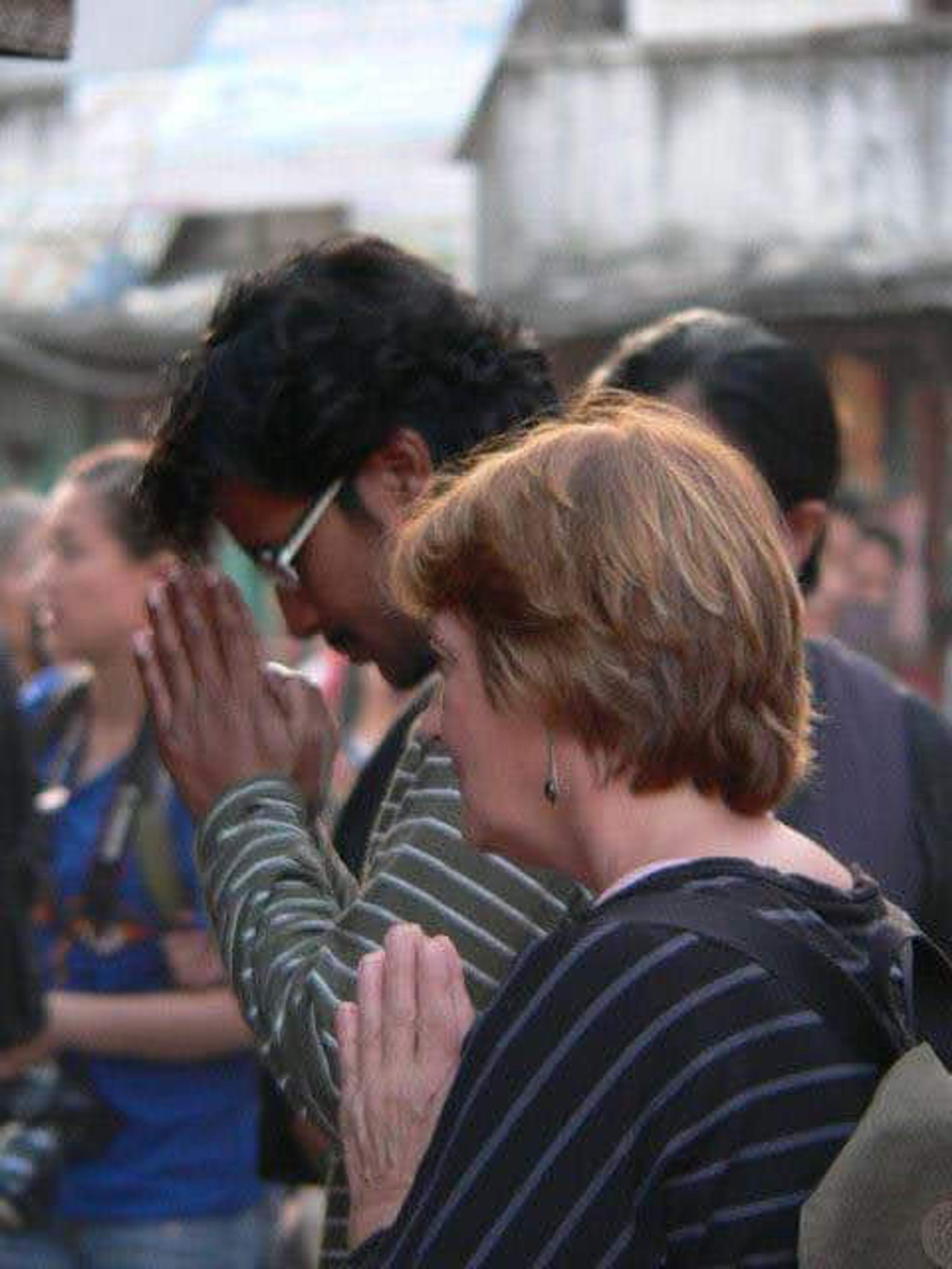 Saroj Khadgi greeting a traveller with folded hands