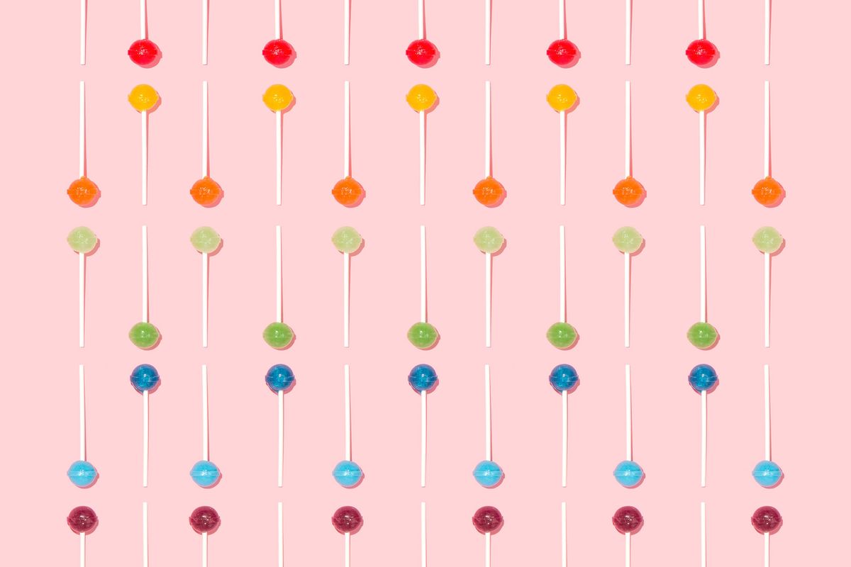 Lollypops arranged pop to pop, stick to stick vertically, with the same coloured pops creating rows