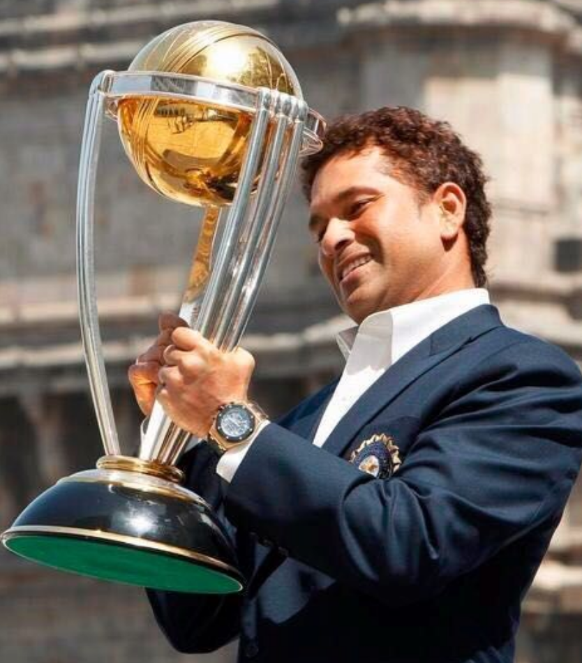 Sachin Tendulkar holding the World Cup trophy