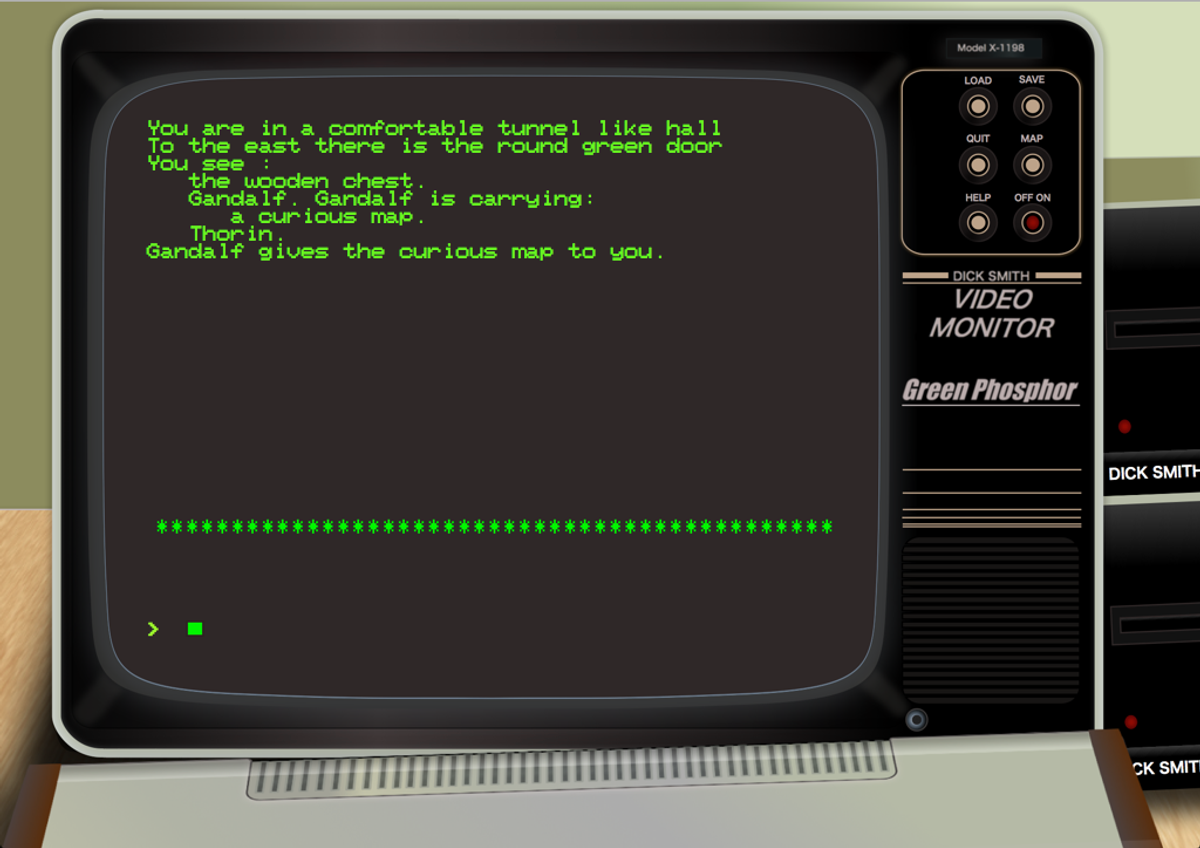 Old video monitor displaying green text