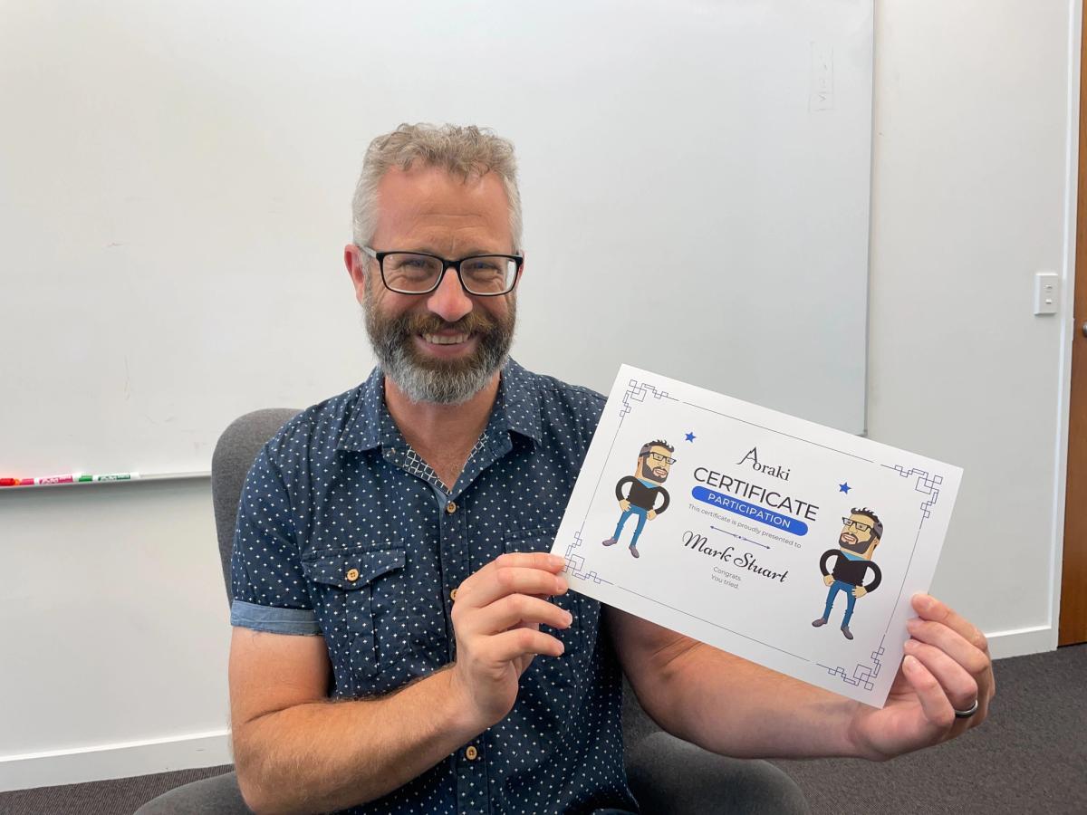 Mark with his certificate 