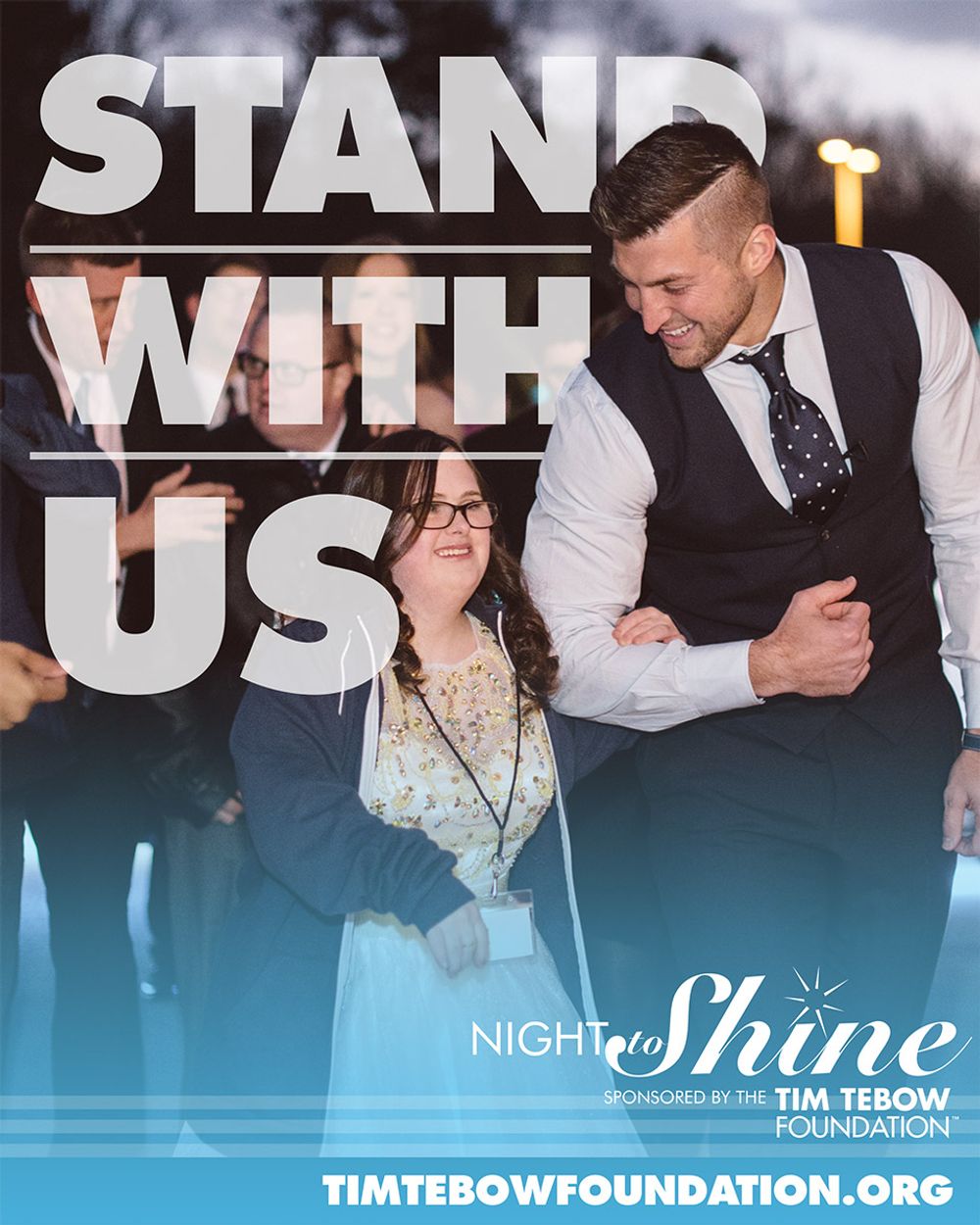 Night to Shine “Stand With Us” graphic showing Tim Tebow walking with a guest