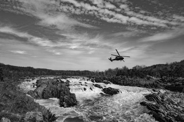 Helicopter over river
