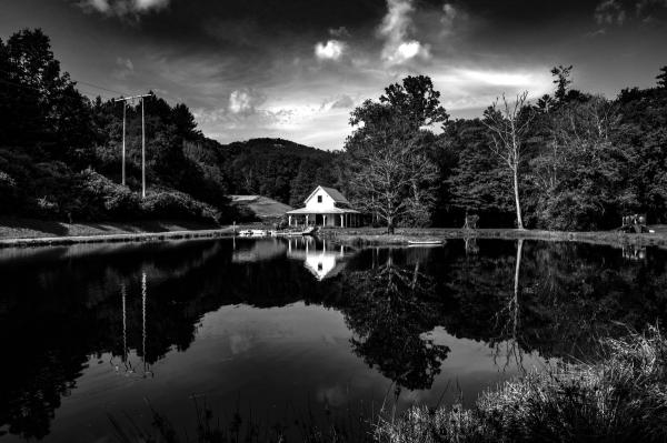 Boat house on mountain pond