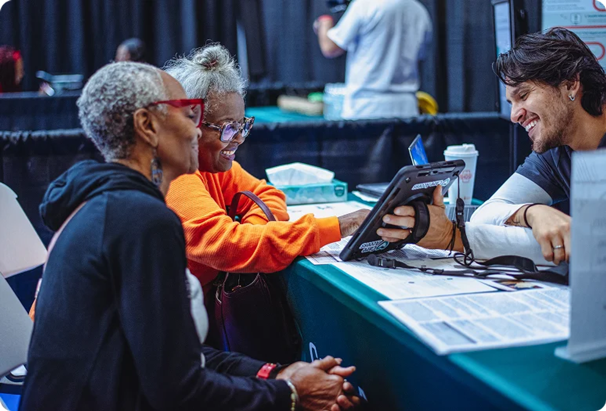 Nurse speaking with patients