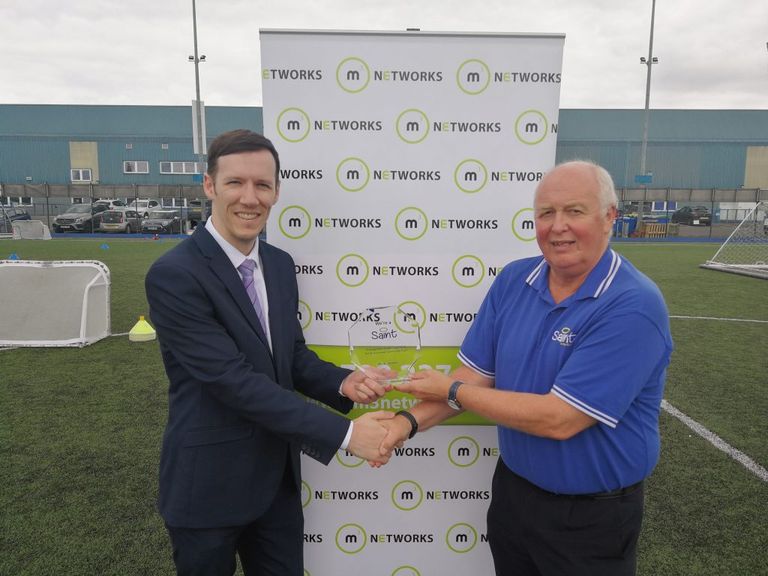 Mark Riddell receiving our Saints in the Community award.
