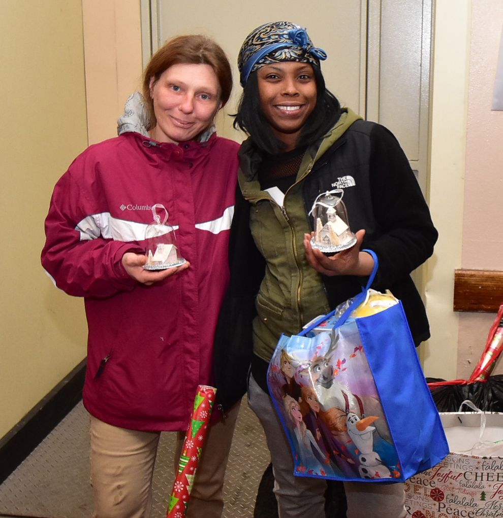 Happy people with donated toys