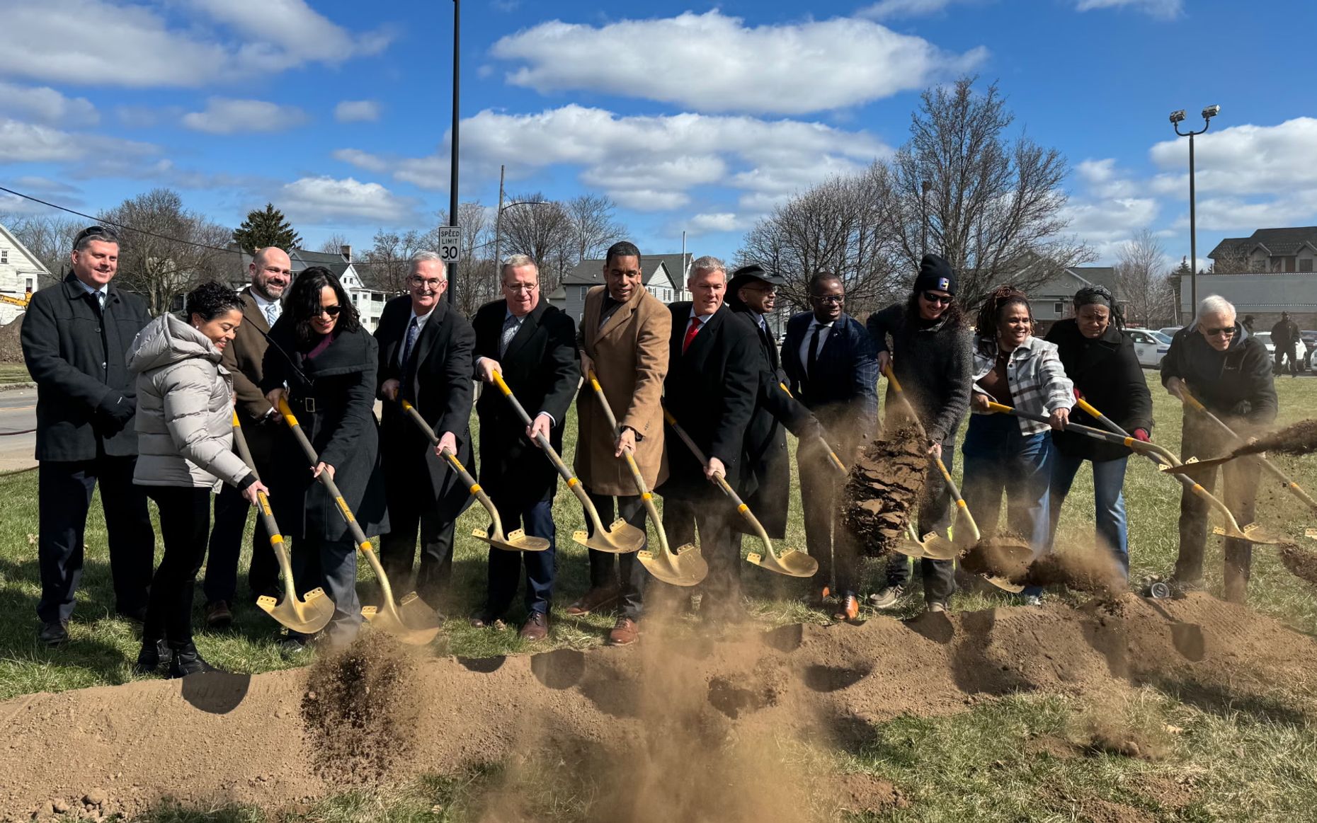 People breaking ground