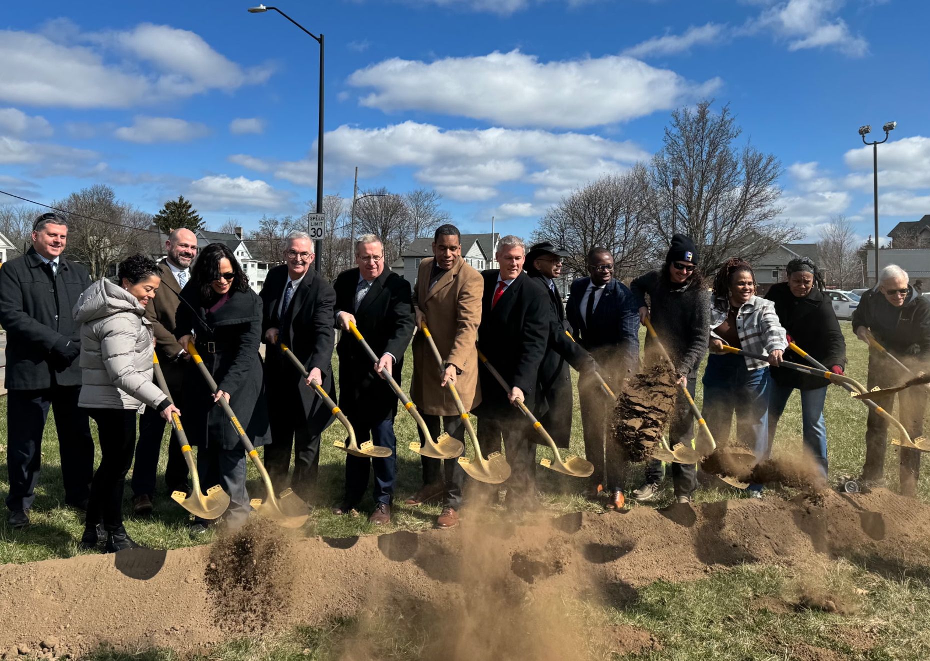 People breaking ground